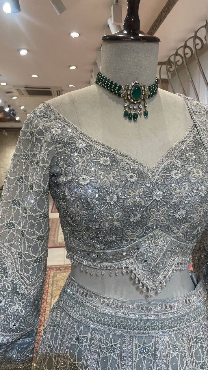 Grey net lehenga with sequin embellishments