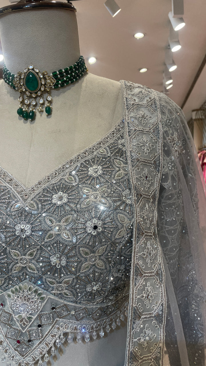 Grey net lehenga with sequin embellishments