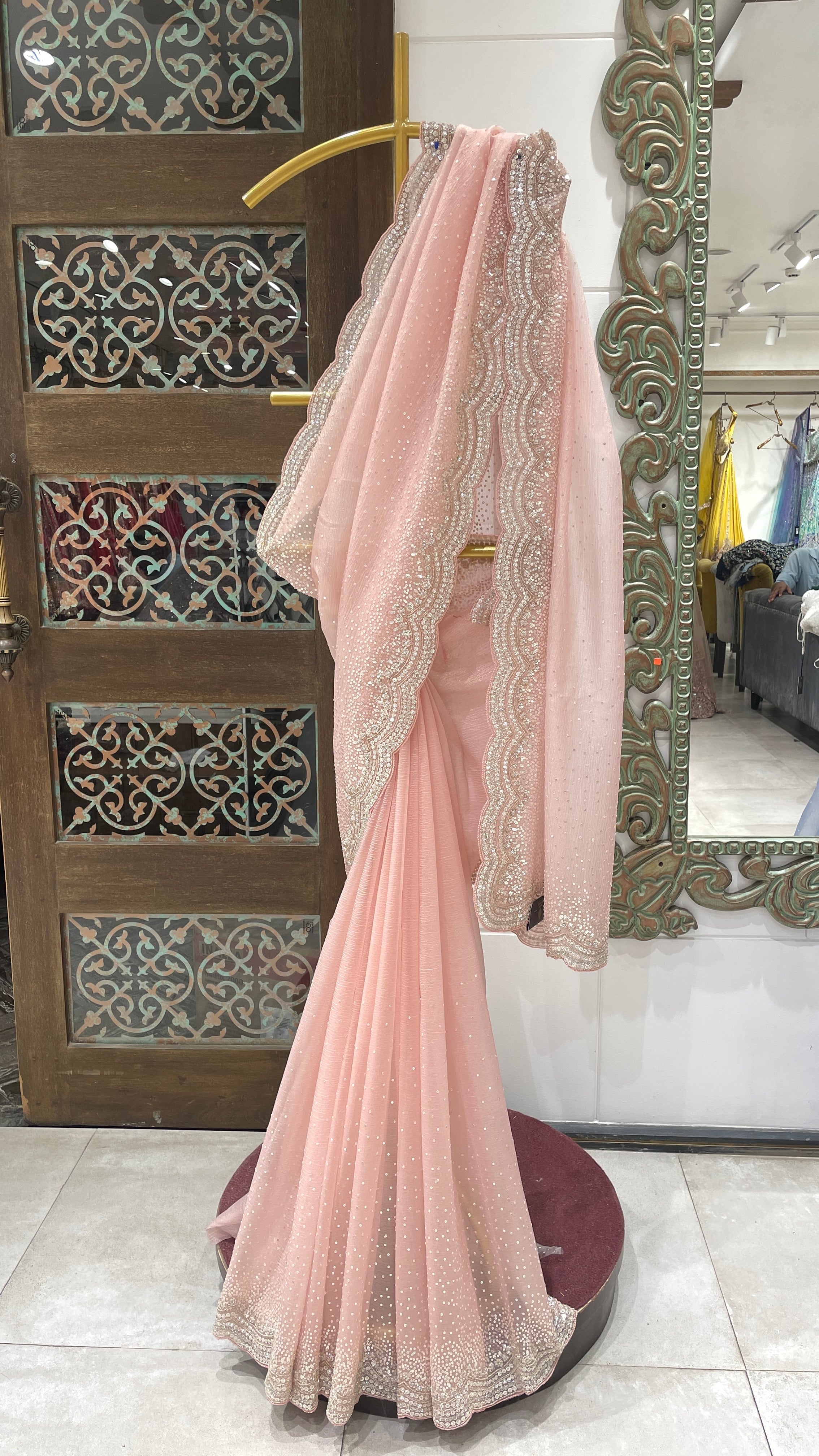 Pastel Pink Scalloped Sequin Border Net Saree