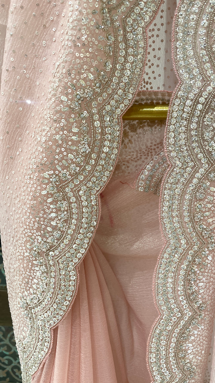 Pastel pink tissue organza saree