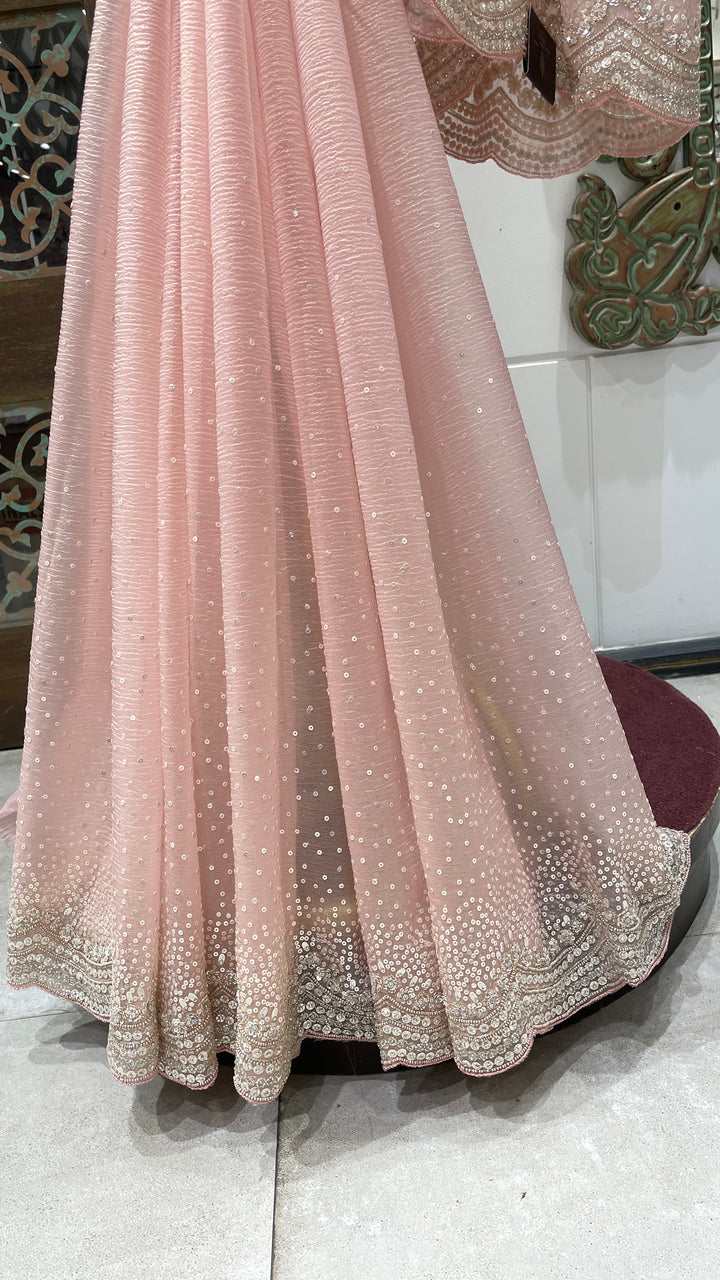 Pastel pink tissue organza saree