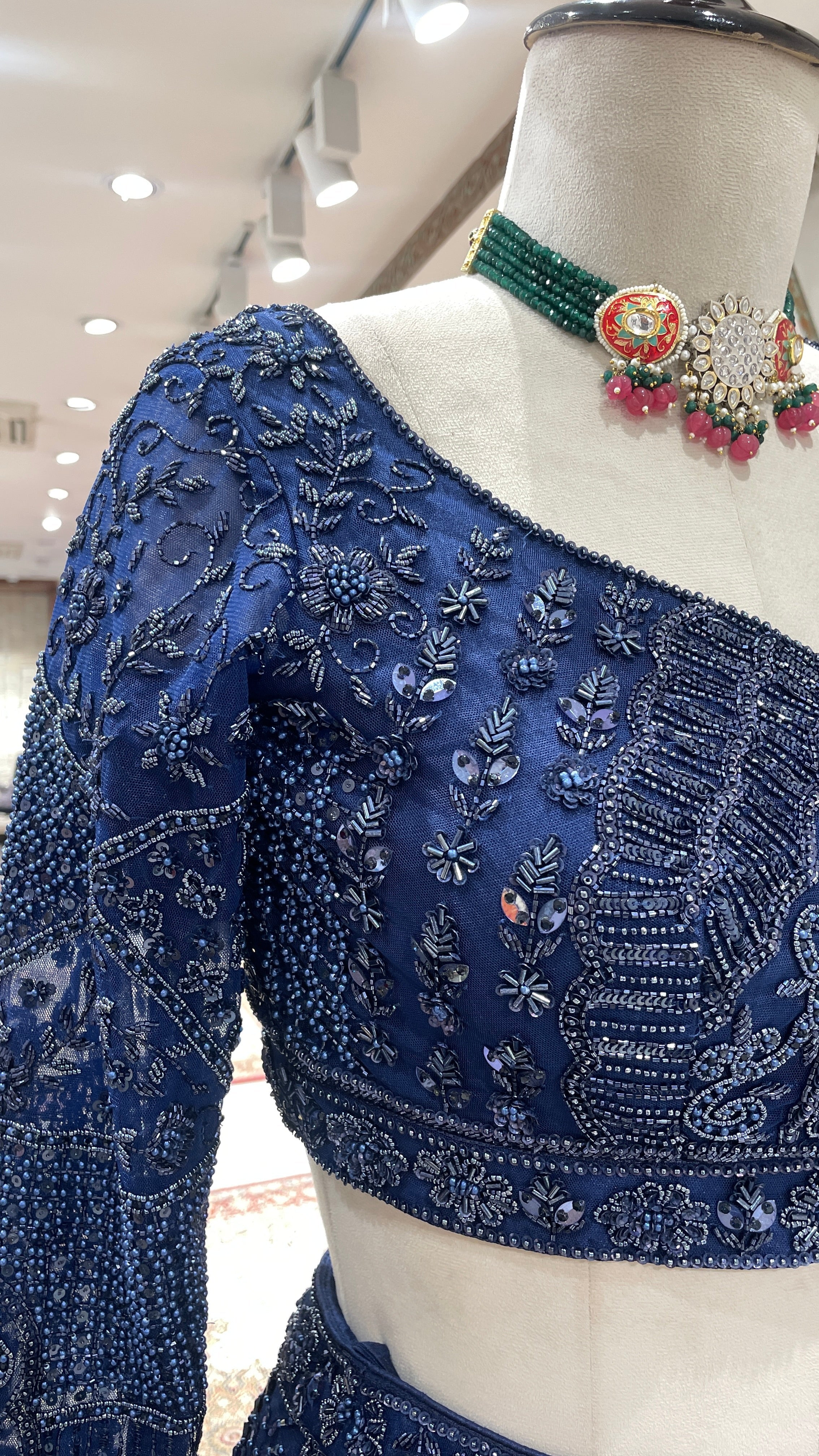 Royal blue lehenga with sequins cutdana and pot embroidery