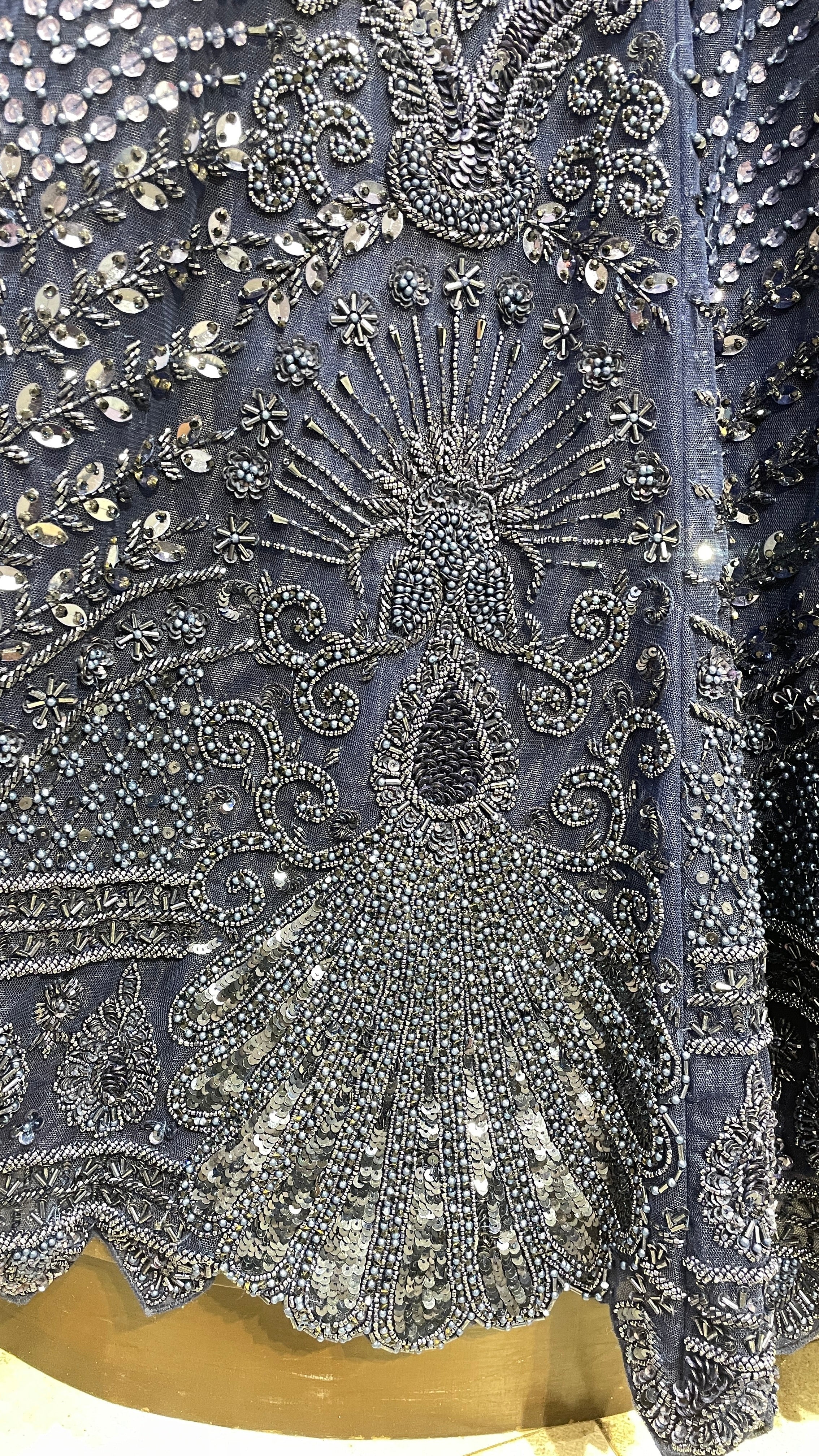 Royal blue lehenga with sequins cutdana and pot embroidery