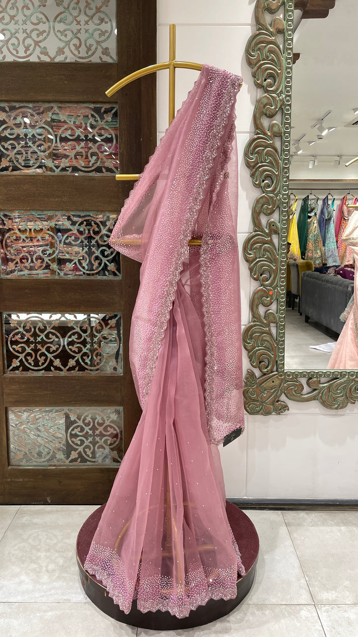 Pink tissue organza saree with sequin and cutdana embellishments