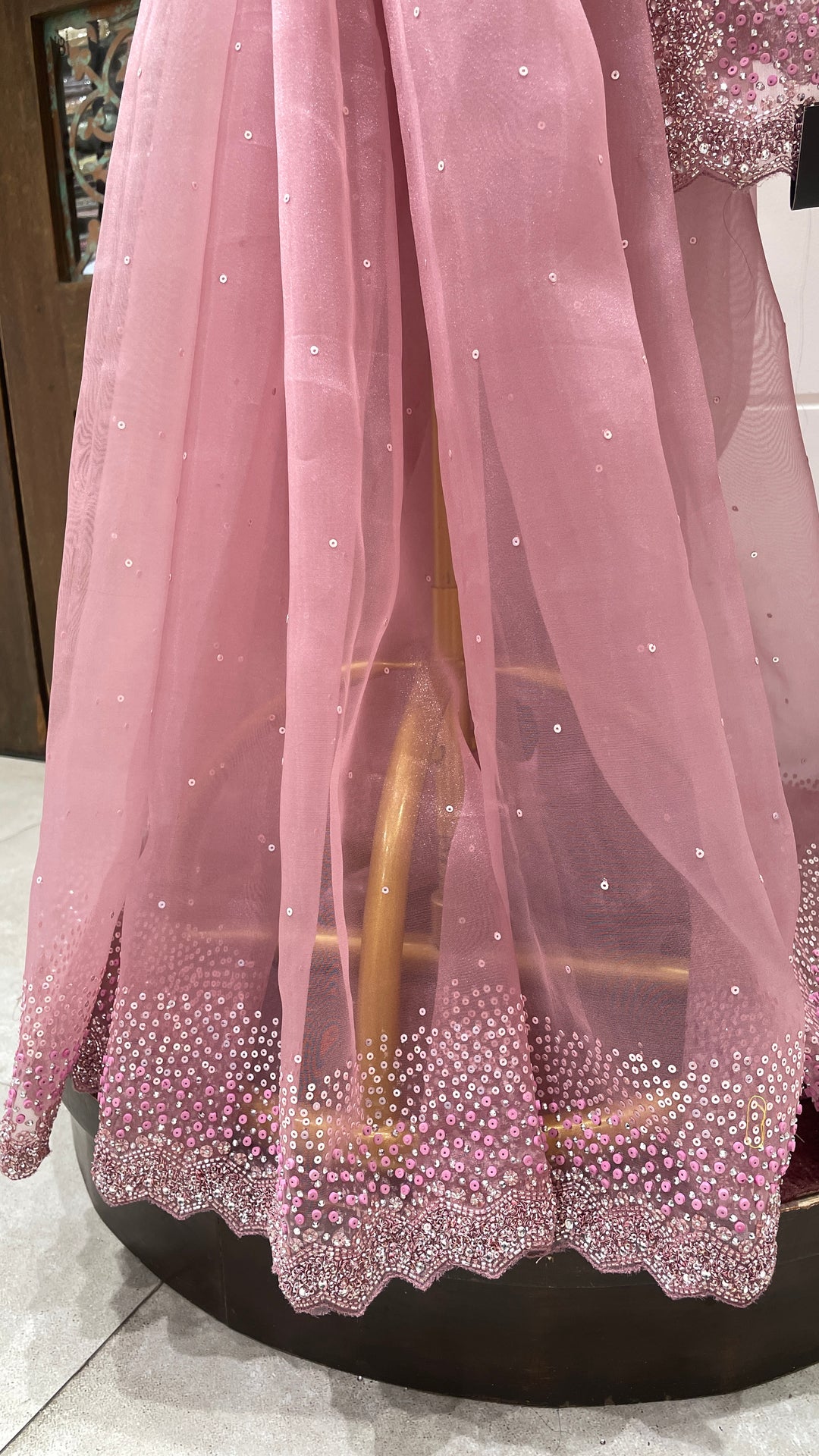 Pink tissue organza saree with sequin and cutdana embellishments