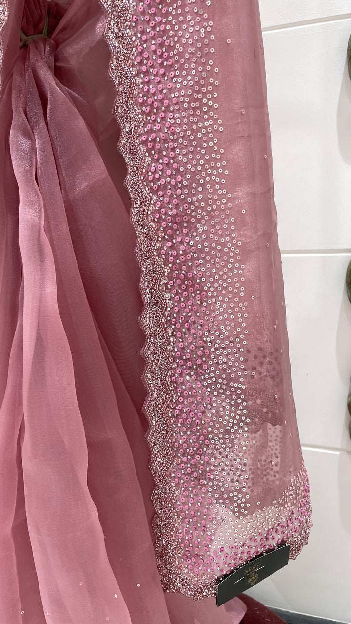 Pink tissue organza saree with sequin and cutdana embellishments