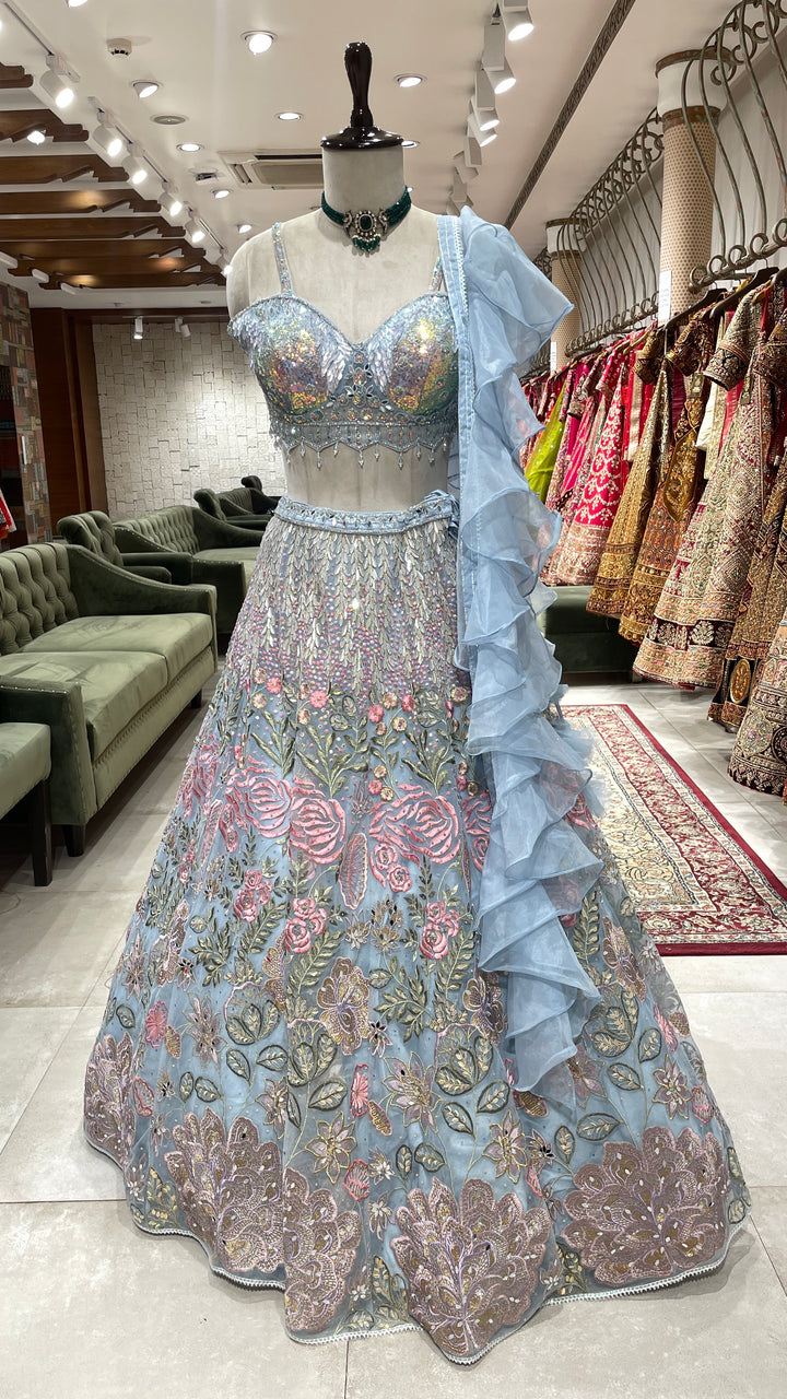 Pastel blue lehenga with floral motifs