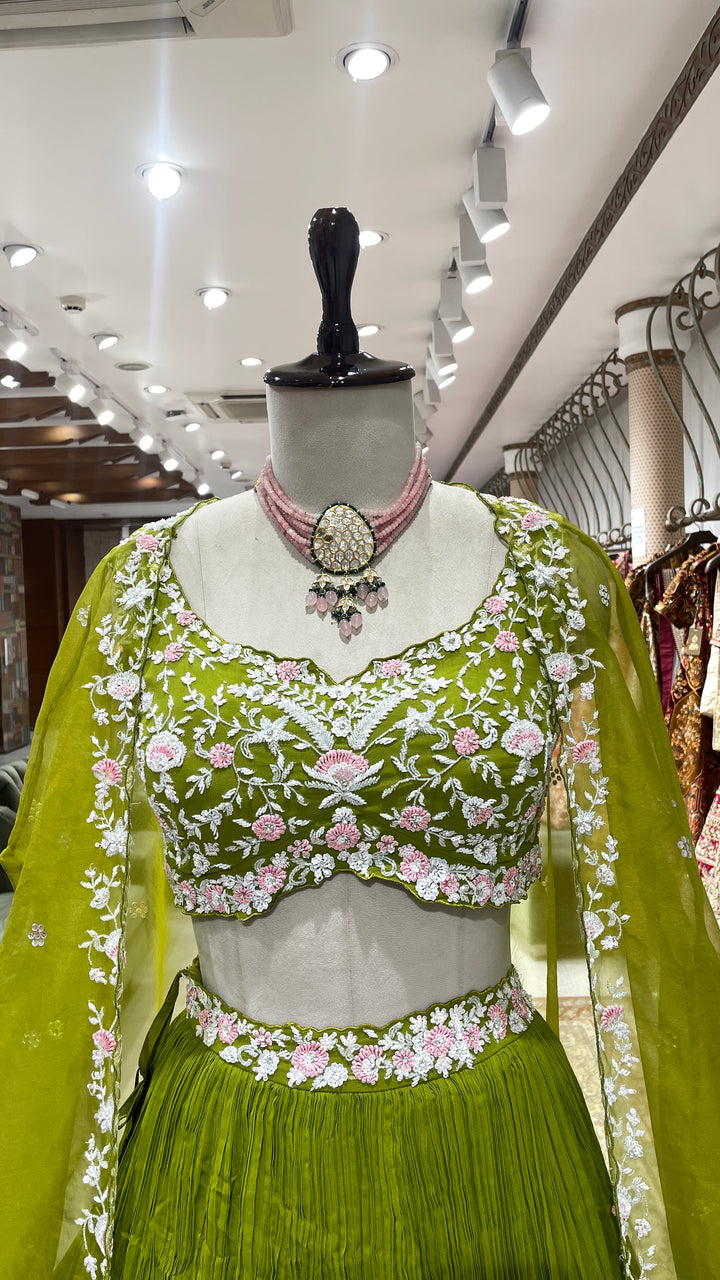 Green cape lehenga with floral motifs