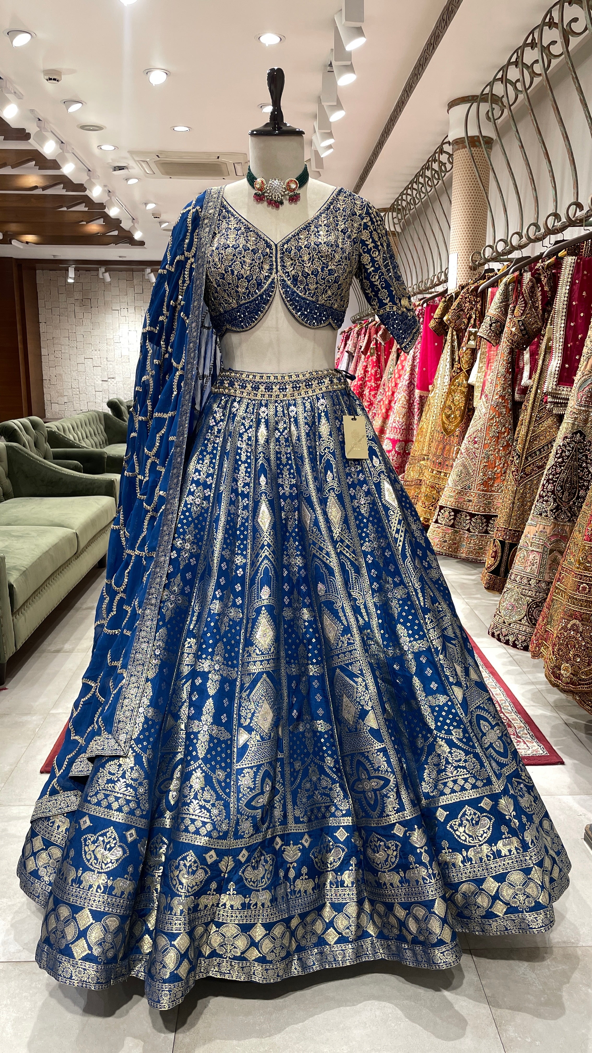 Royal blue silk lehenga with gold detailing