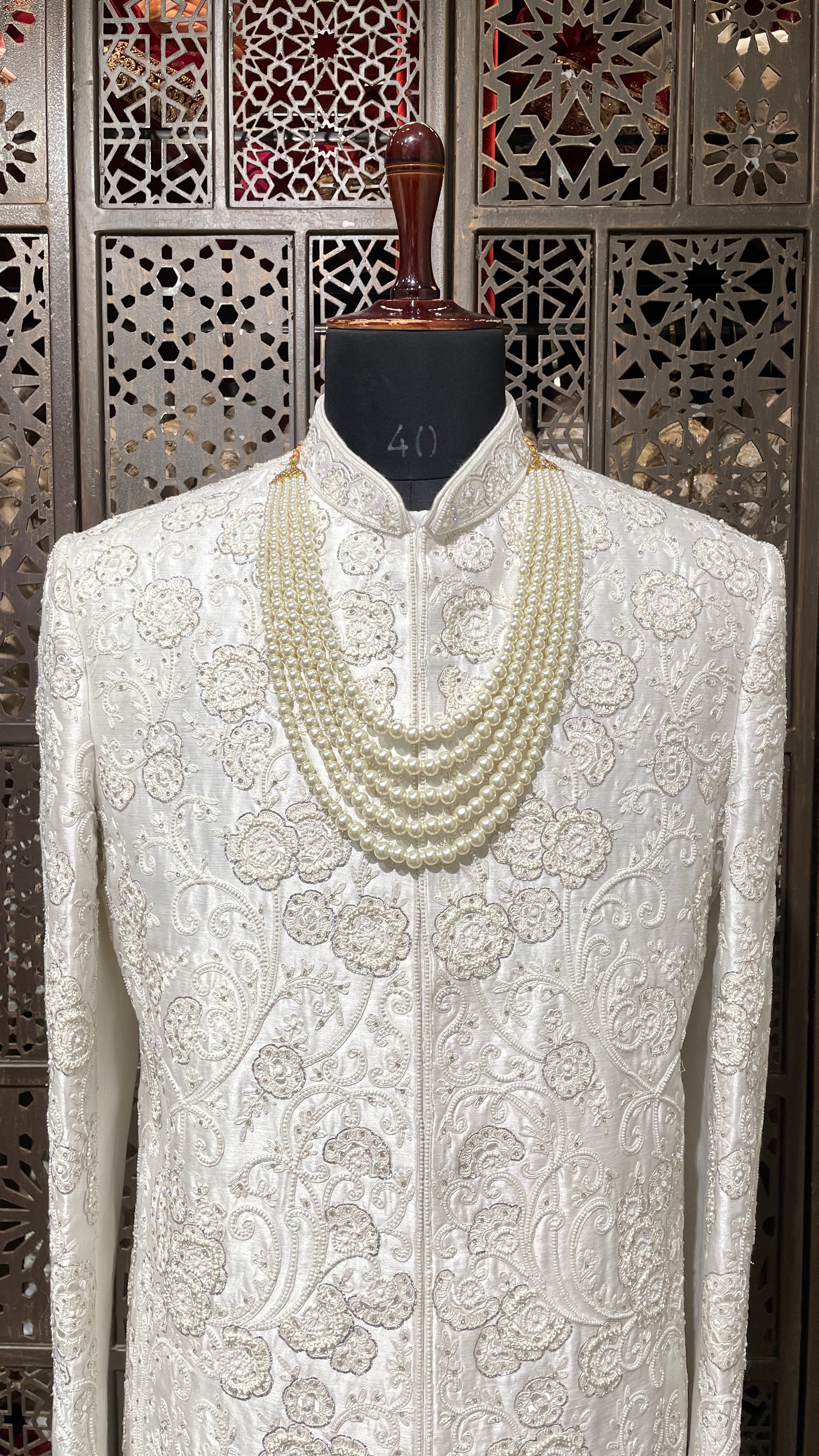 Ivory silk men’s sherwani with pearl and cutdana embellishments
