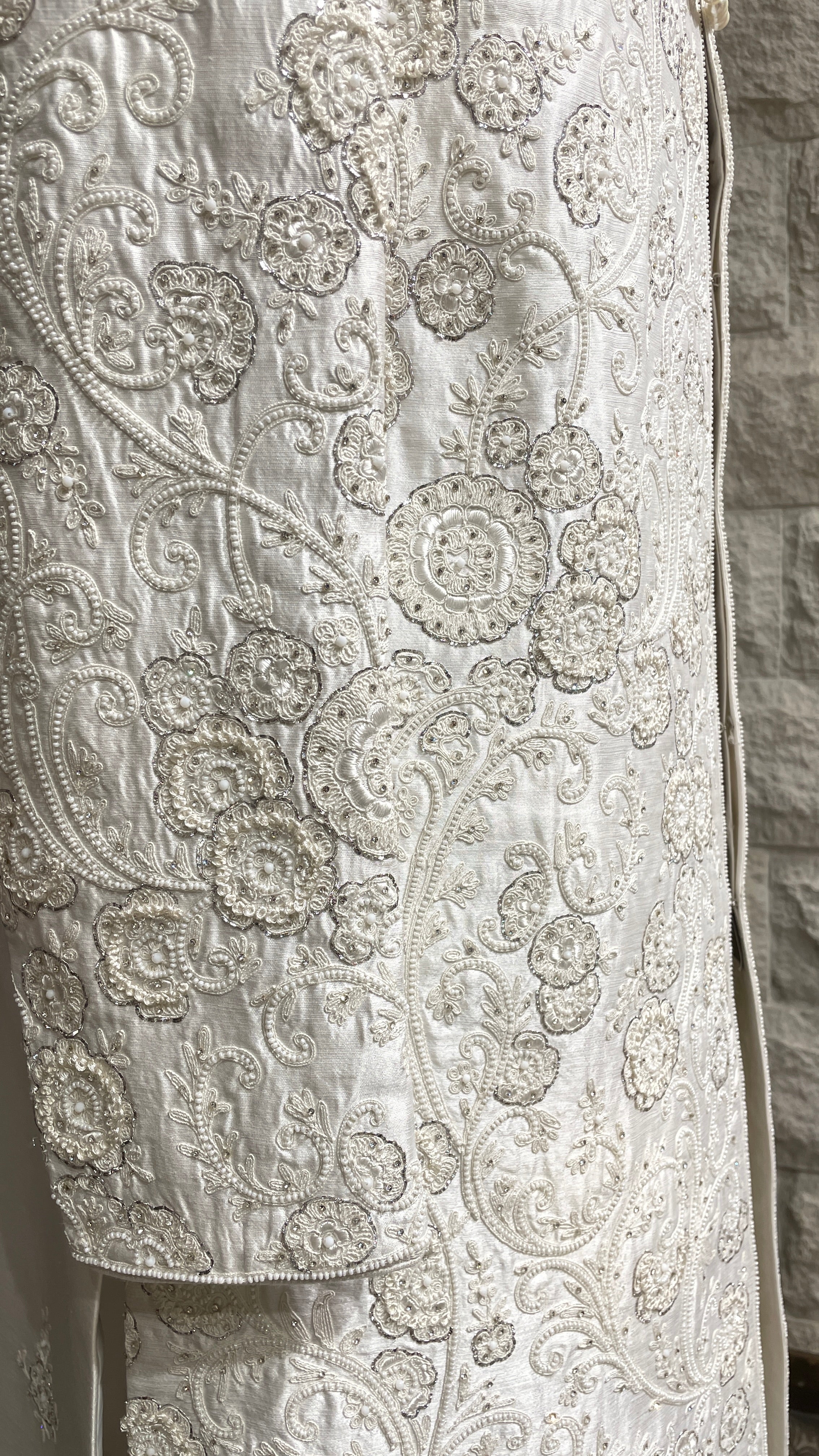 Ivory silk men’s sherwani with pearl and cutdana embellishments