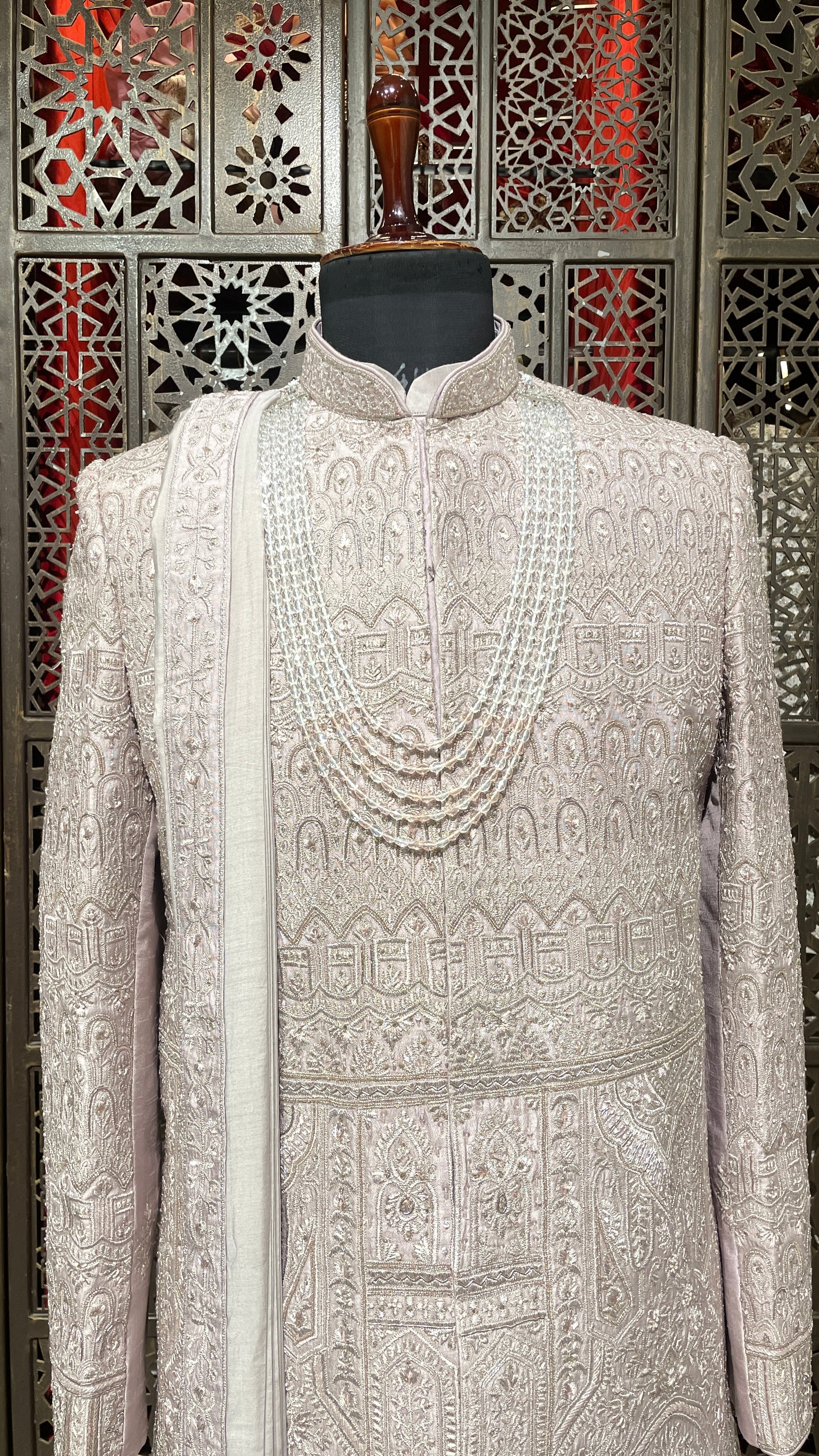Lilac Anarkali style sherwani with gold embellishment
