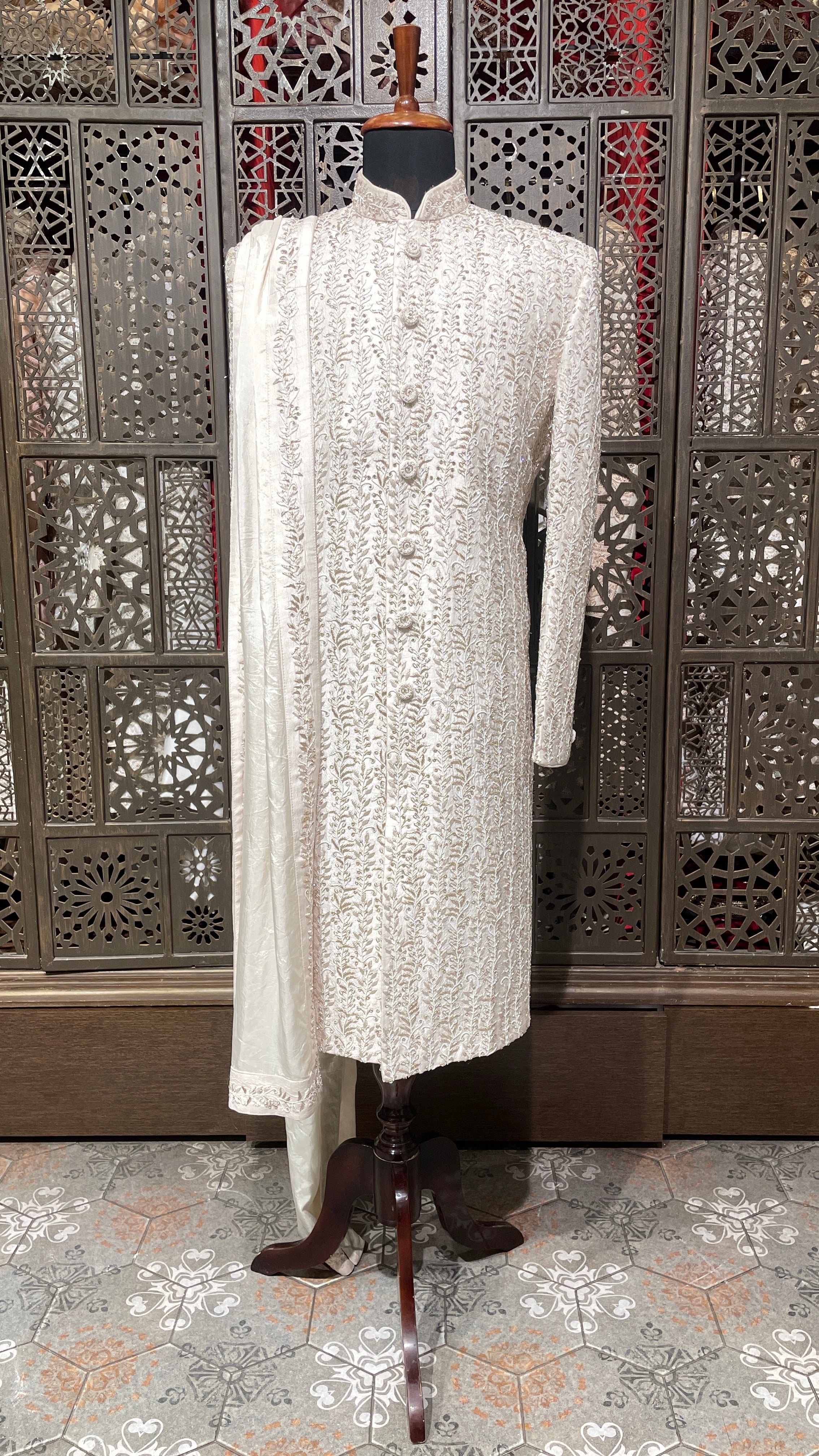 Cream sherwani with zariwork