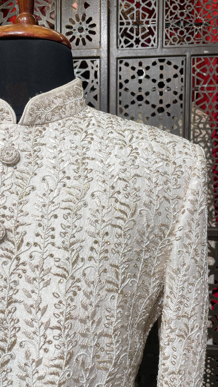 Cream sherwani with zariwork