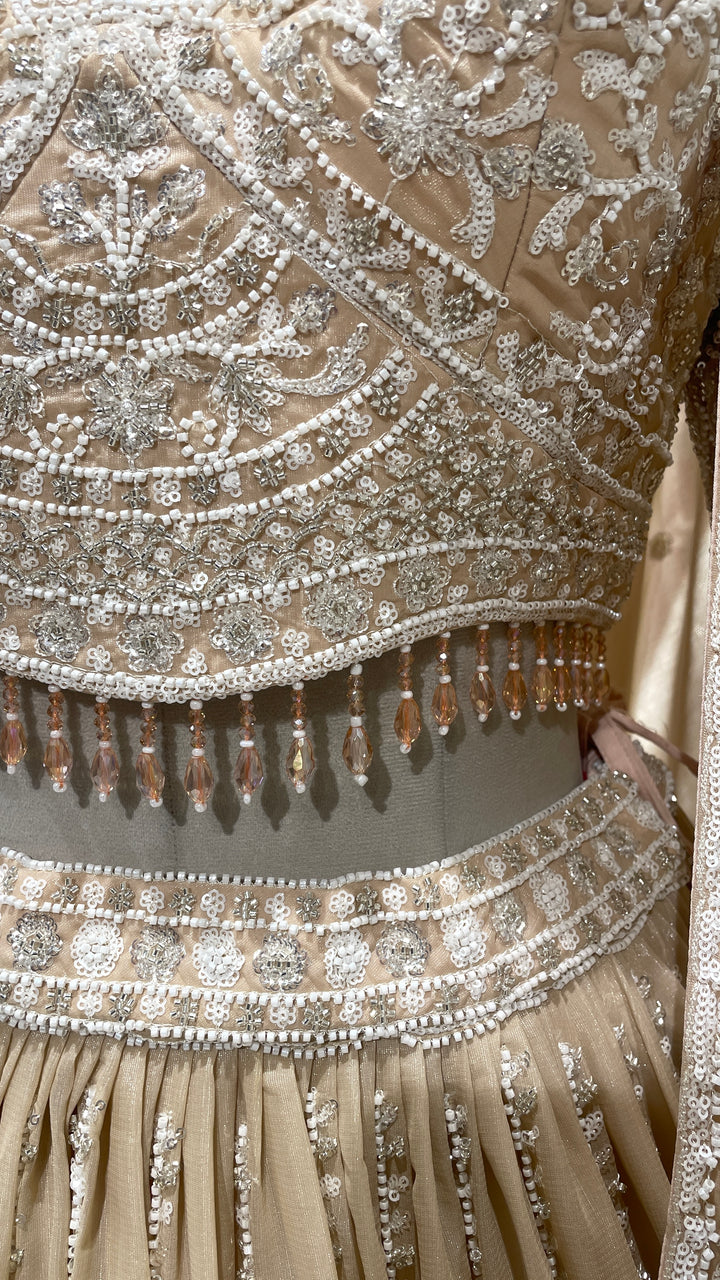 Peach Georgette embellished lehenga with sequins and cutdana