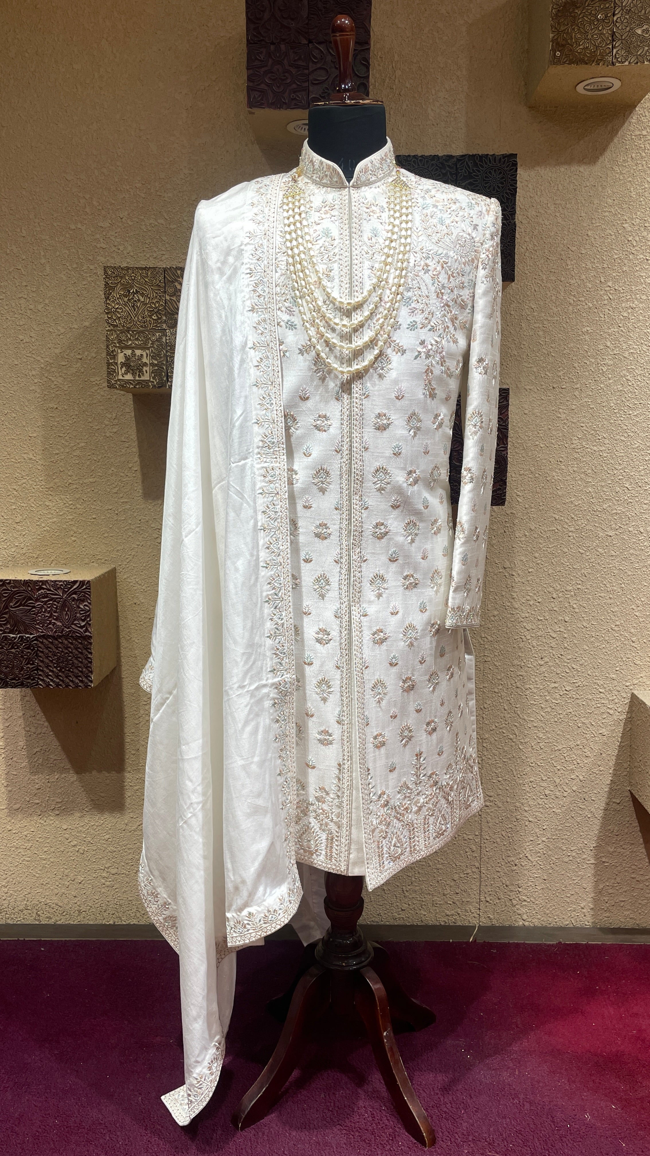 Ivory silk sherwani with floral motifs