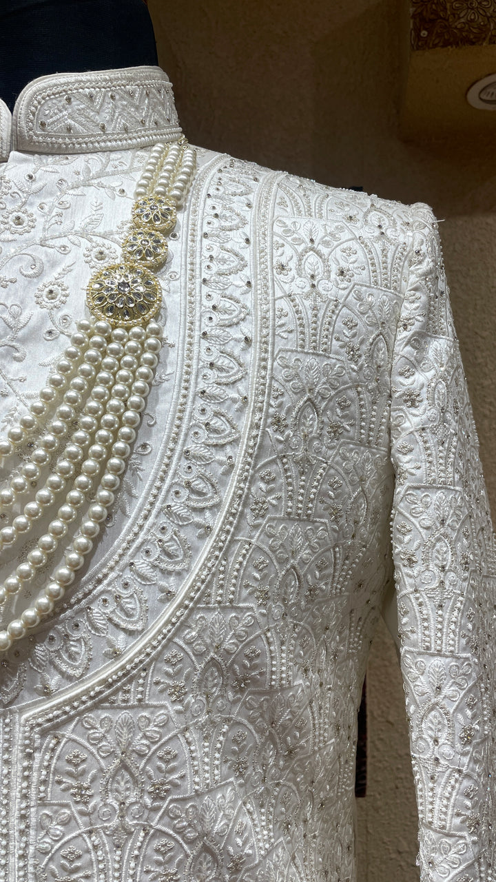 Ivory silk sherwani with threadwork and embellishments