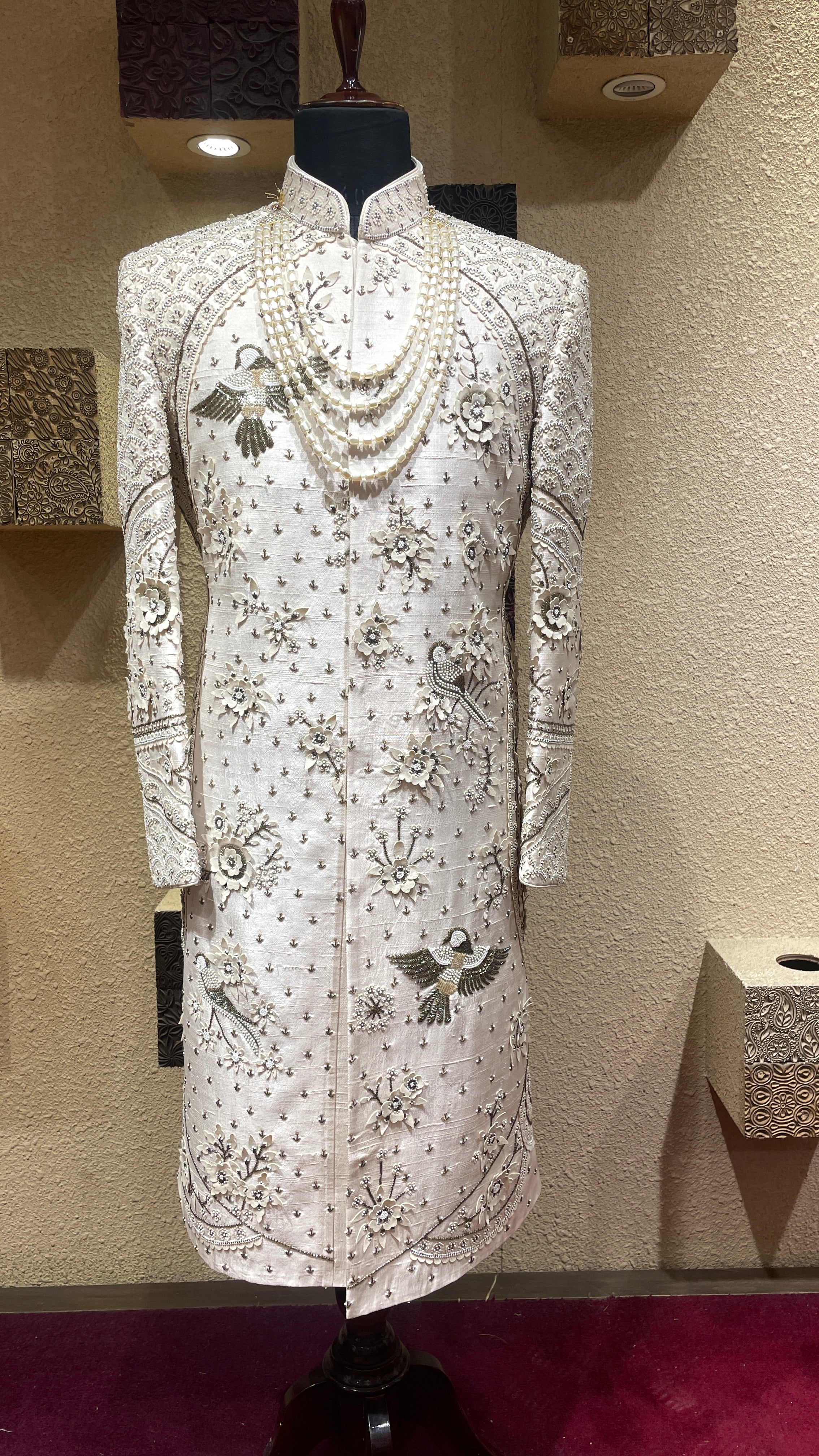 Gold silk sherwani with motifs and cutdana embellishments