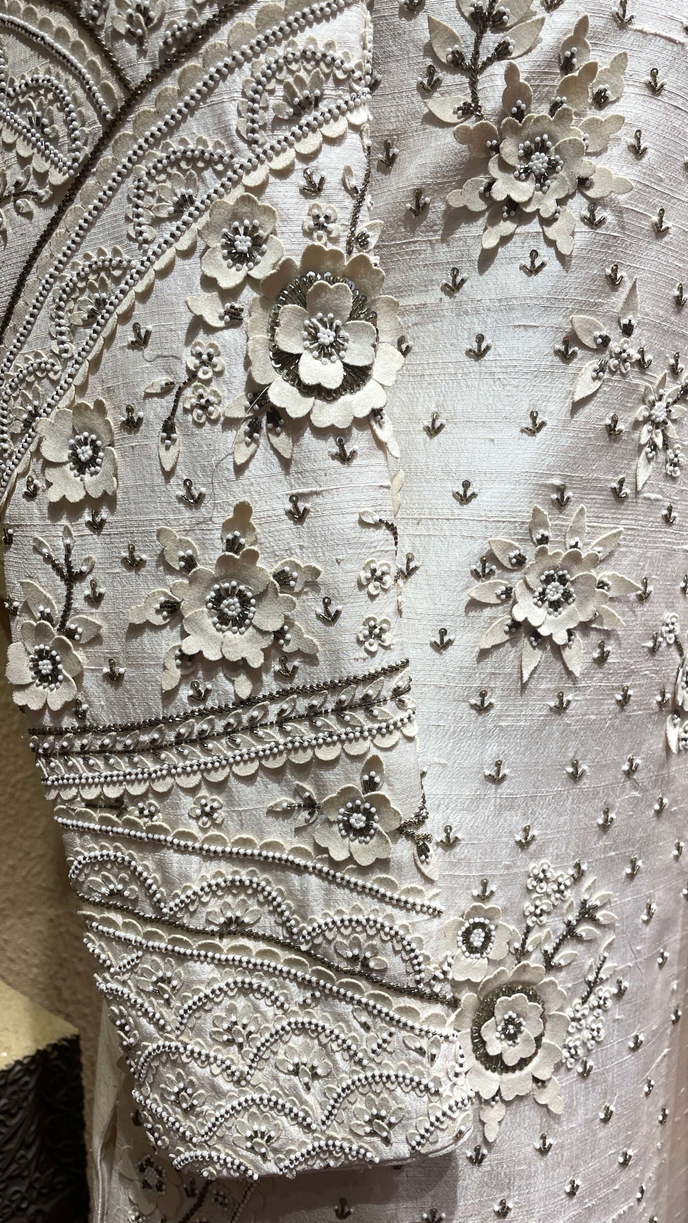 Gold silk sherwani with motifs and cutdana embellishments