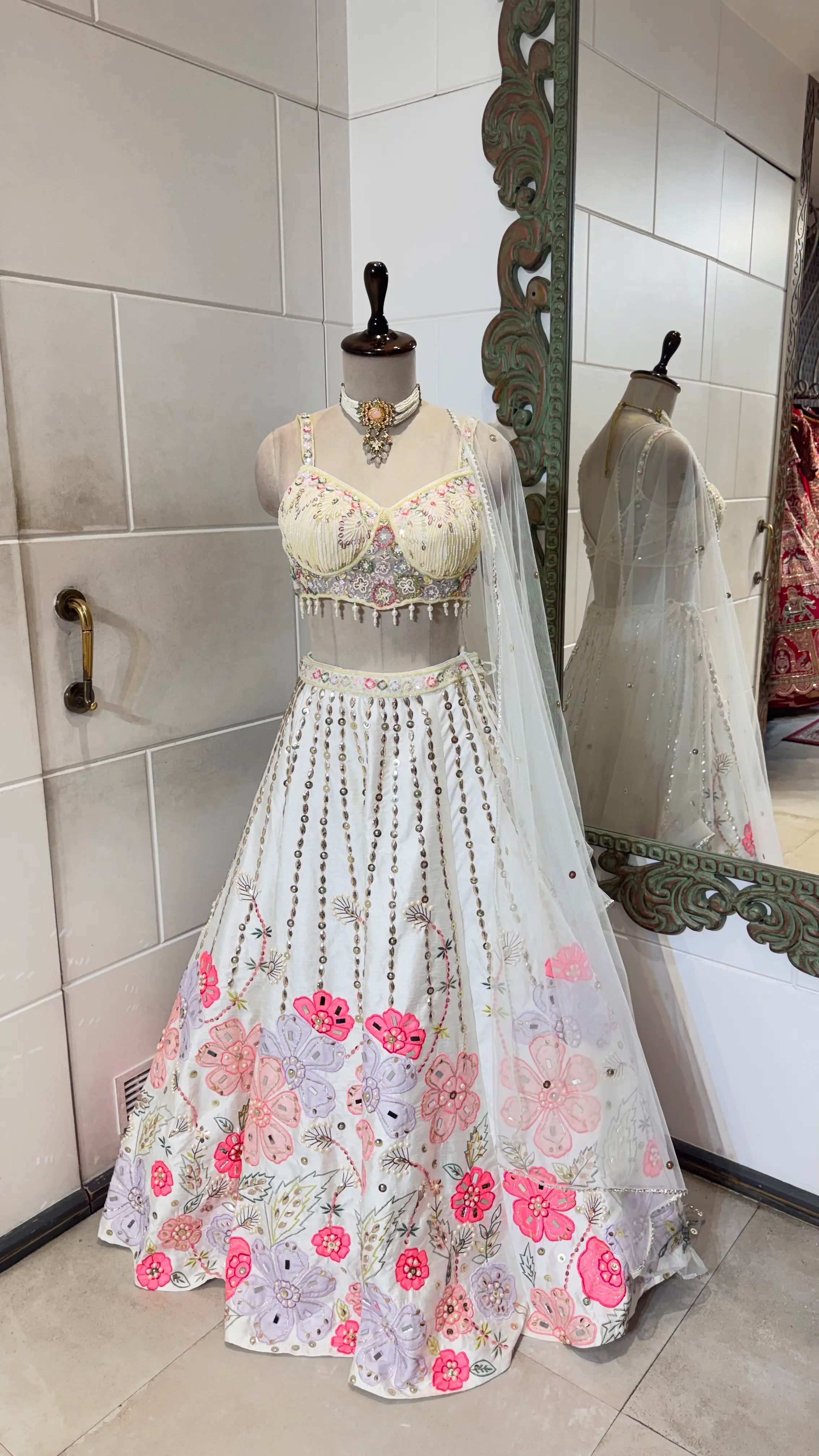 White lehenga with floral embroidery
