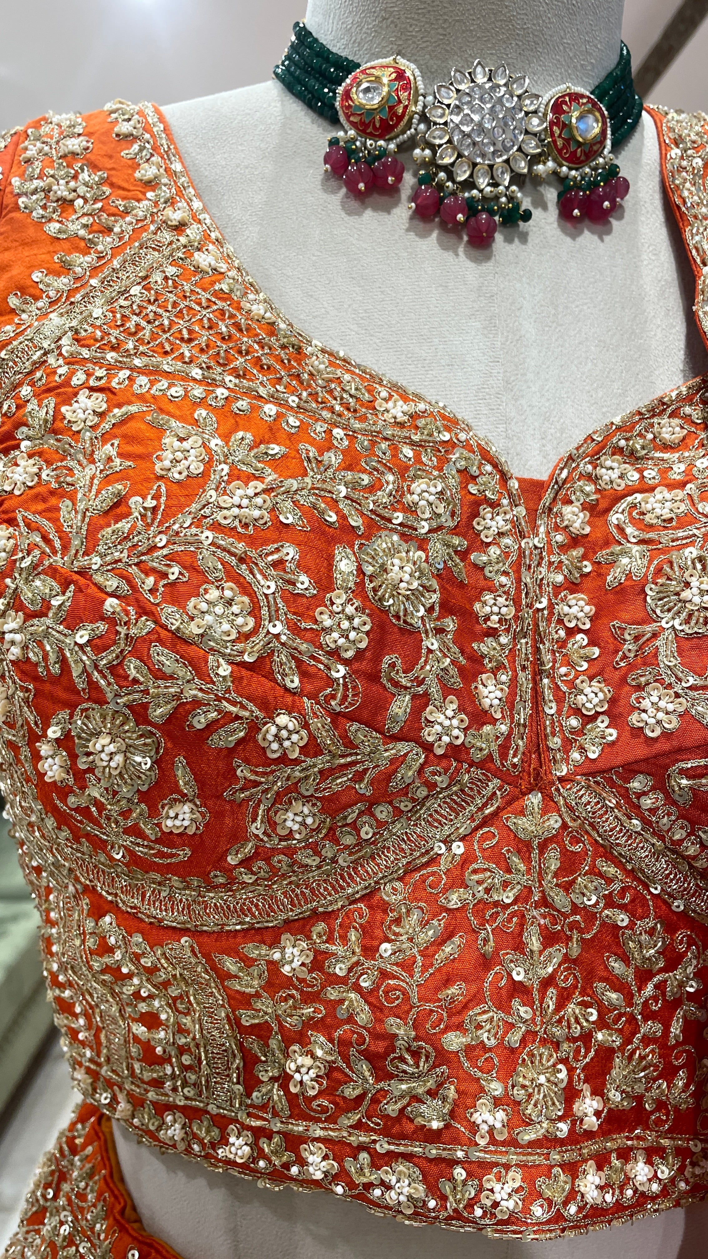 Orange bridal silk lehenga with zariwork