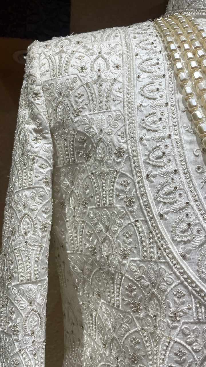 Cream silk sherwani with thread and mirrorwork