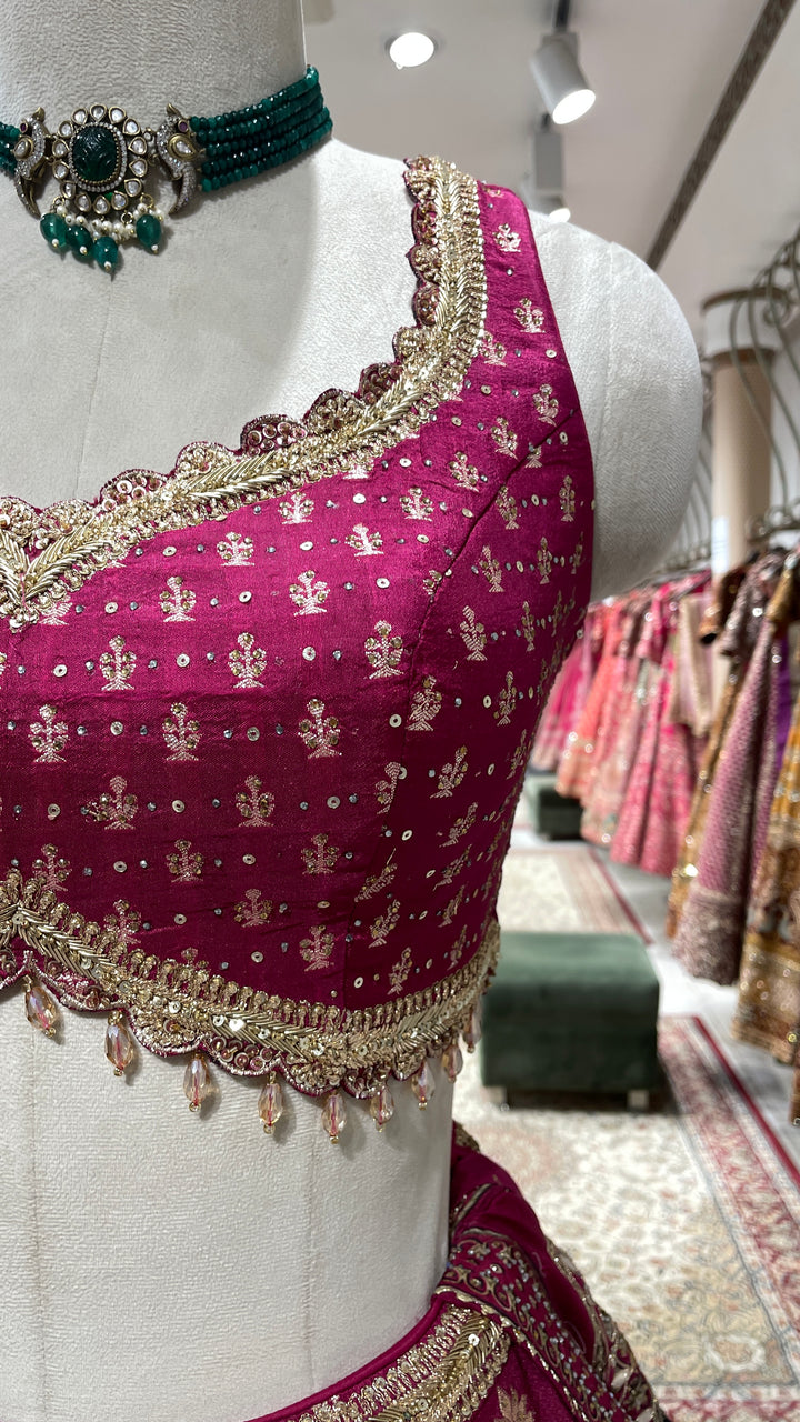 Magenta Banarasi silk lehenga with motifs