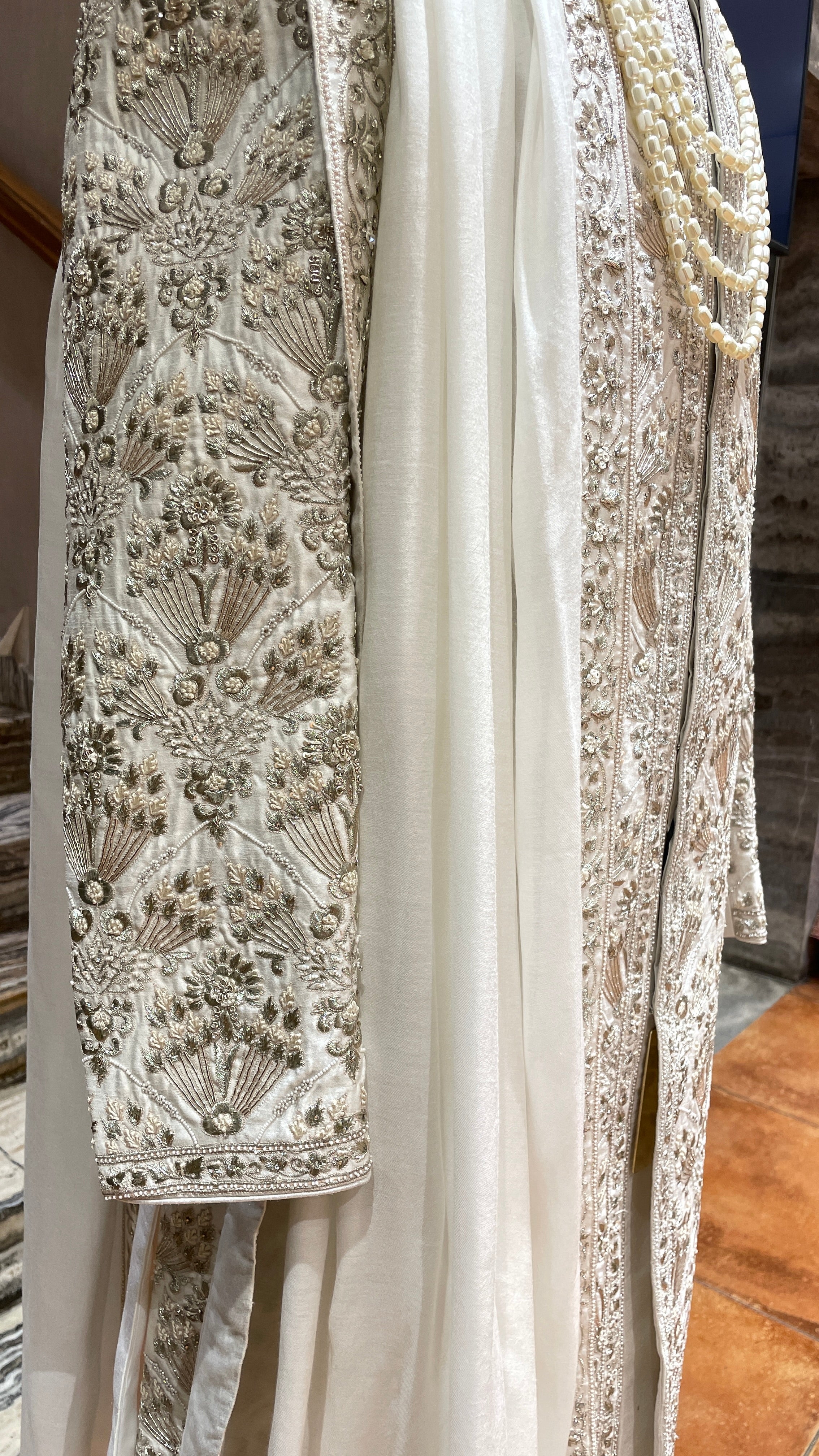 Ivory silk sherwani with motifs
