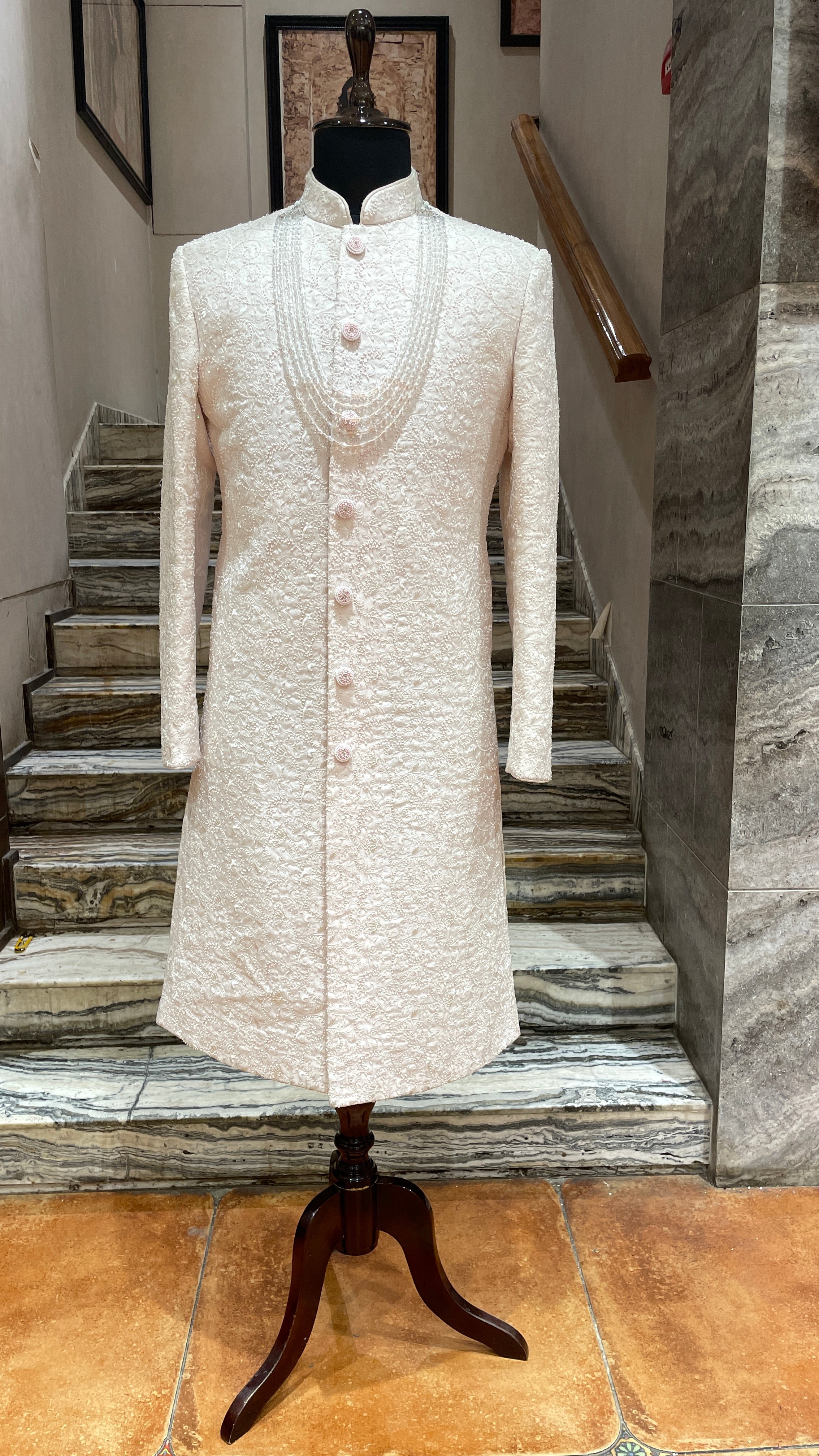 Ivory sherwani with pastel pink beadwork