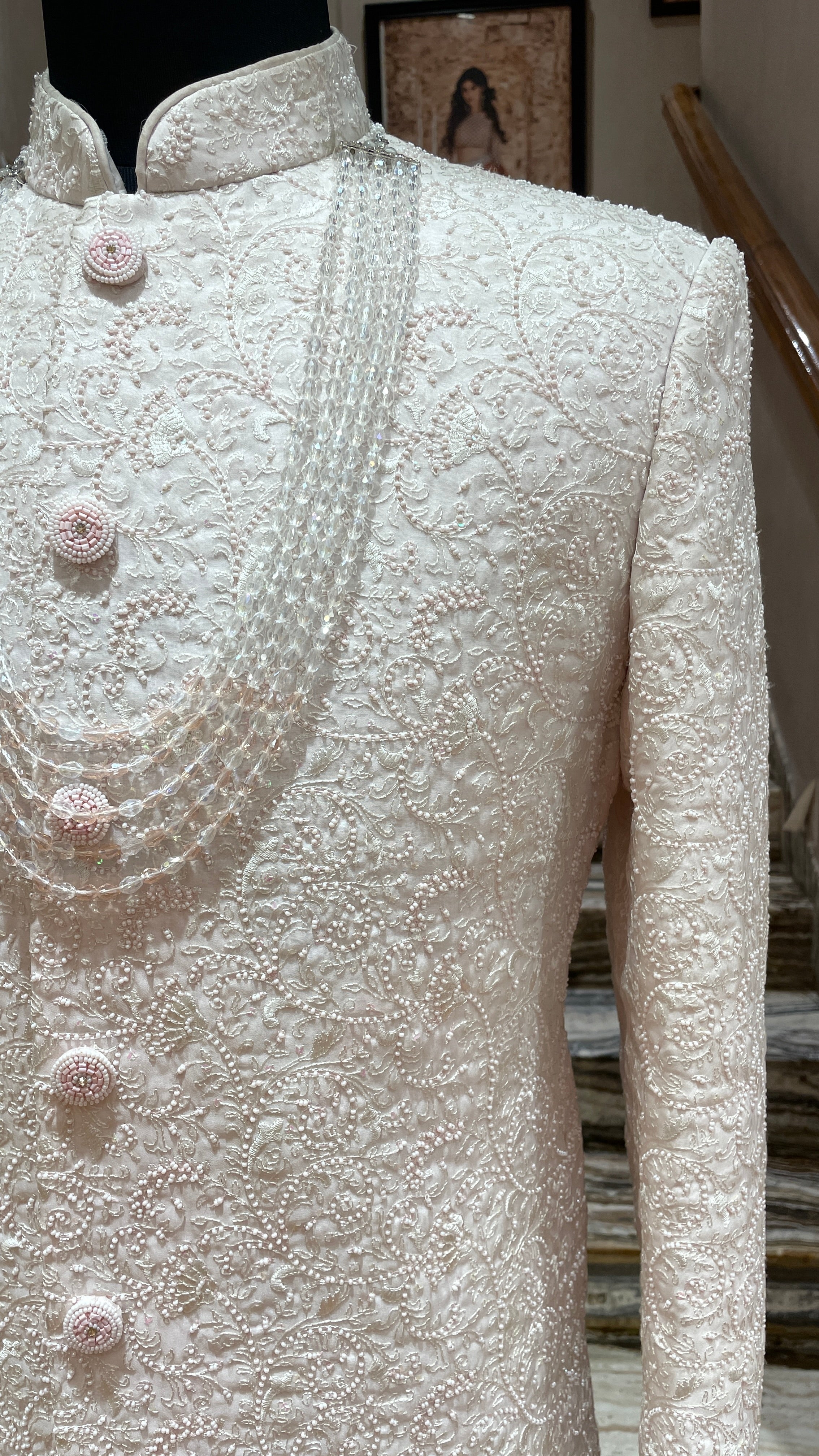 Ivory sherwani with pastel pink beadwork