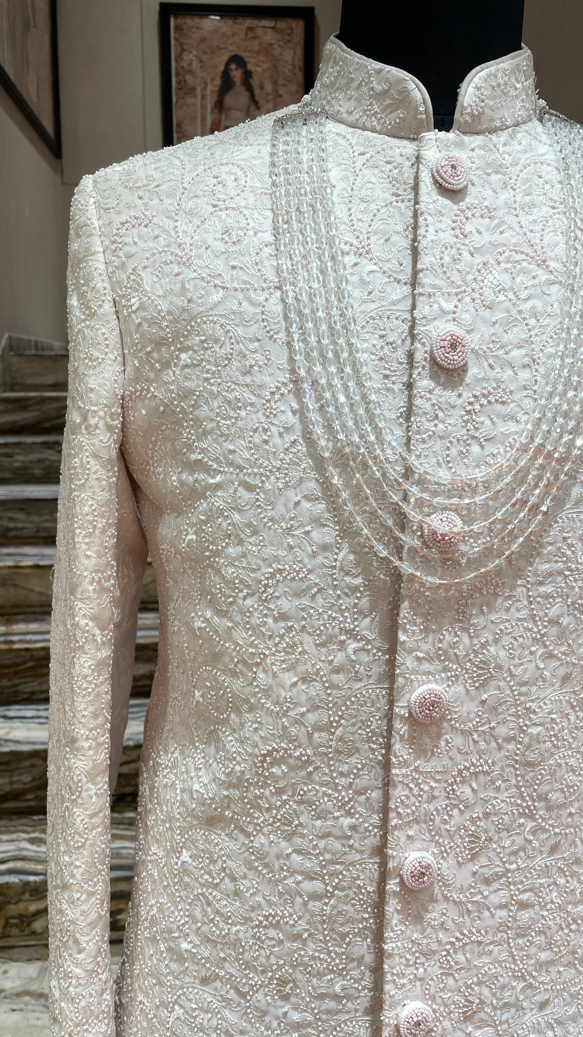 Ivory sherwani with pastel pink beadwork