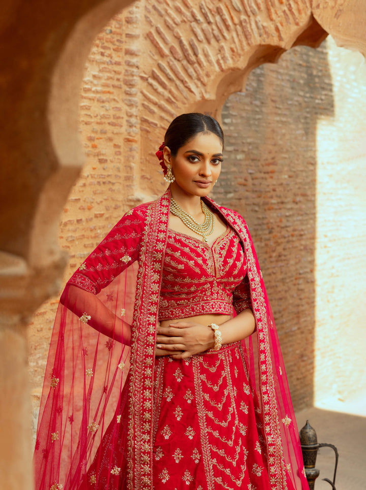 Royal Red Silk Bridal Lehenga with Floral Motifs, Sequins, and Cutdana Embellishments