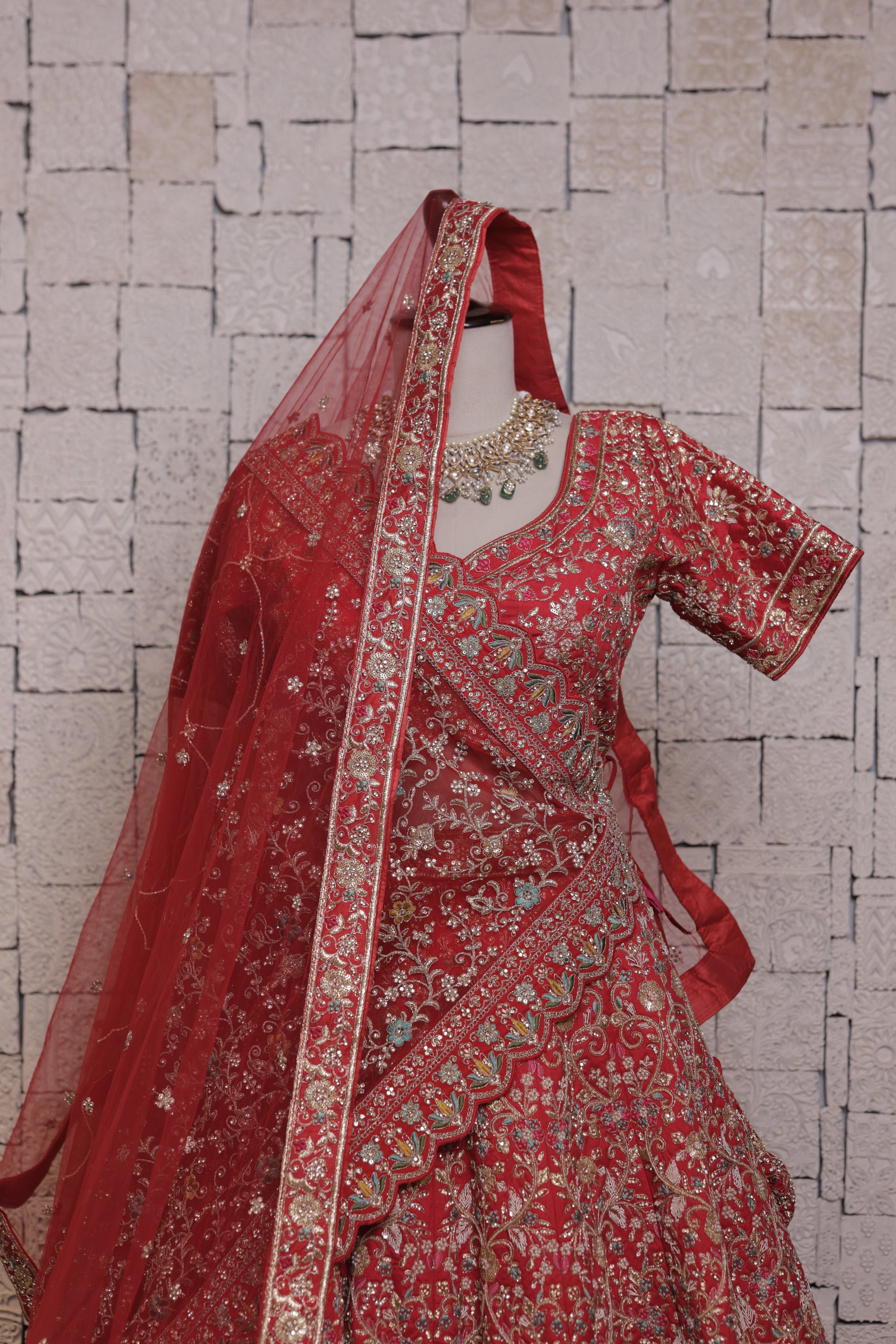 Red  bridal lehenga with peacock embroidery design