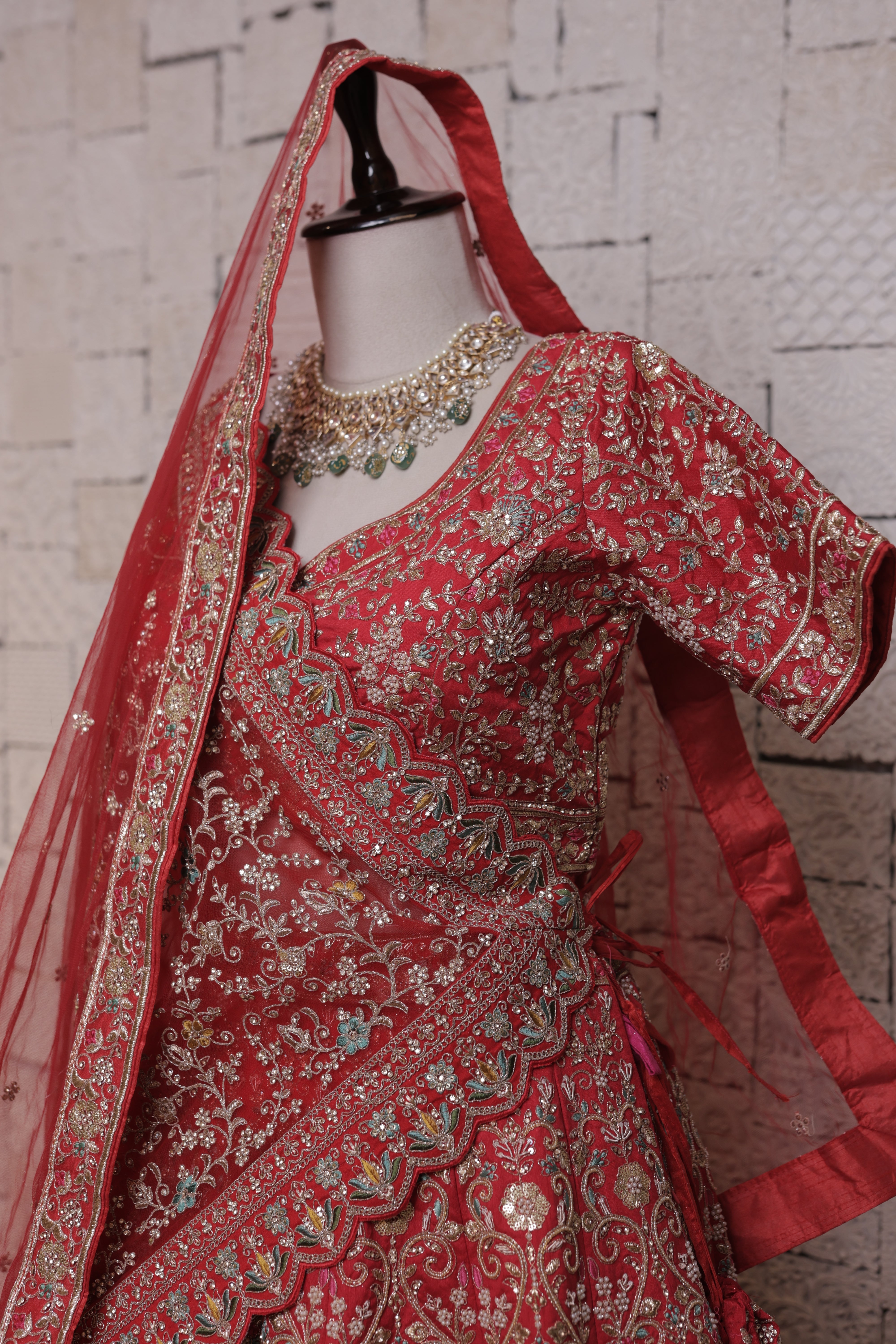 Red  bridal lehenga with peacock embroidery design
