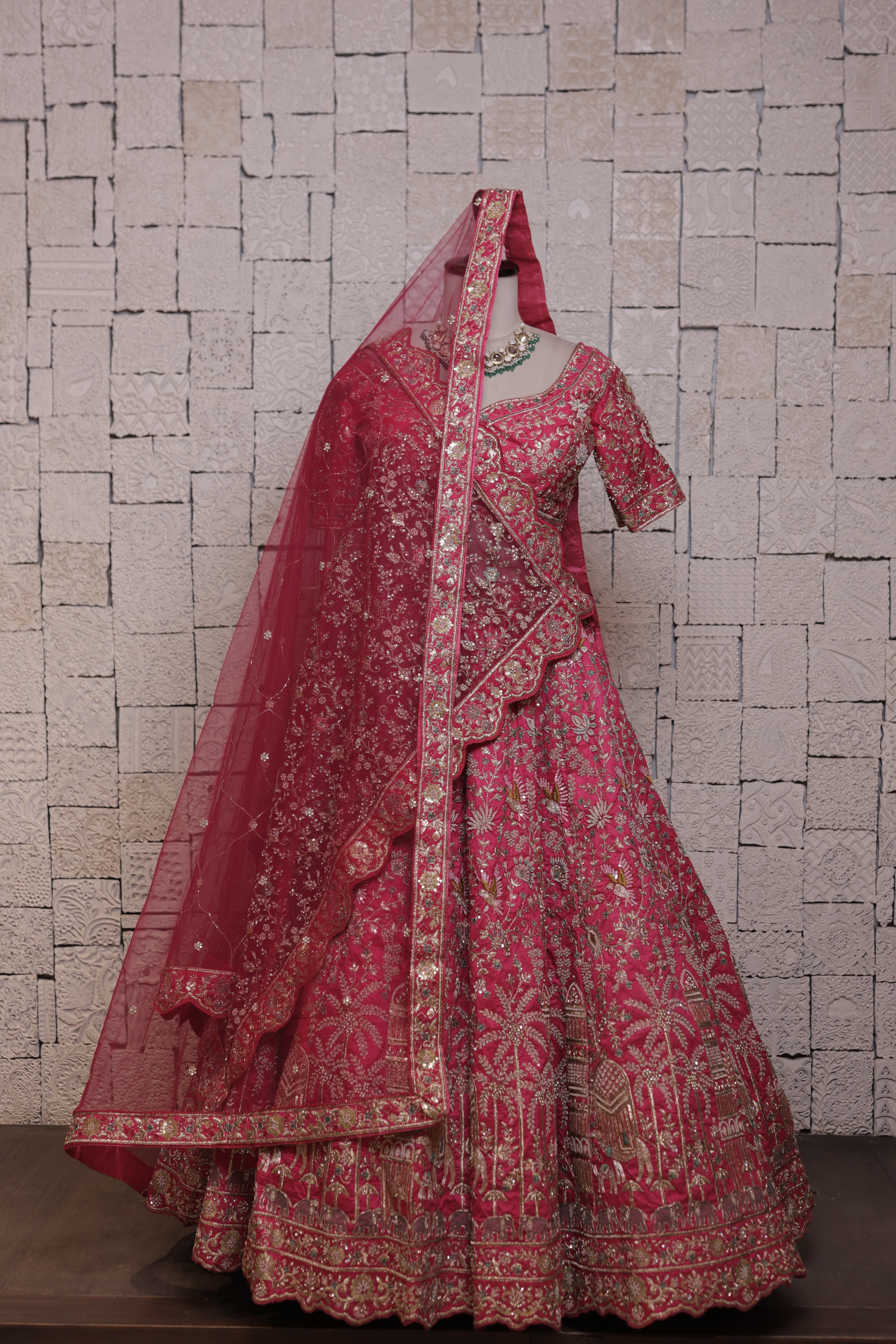 Rani bridal lehenga with flower & bird embroidery design