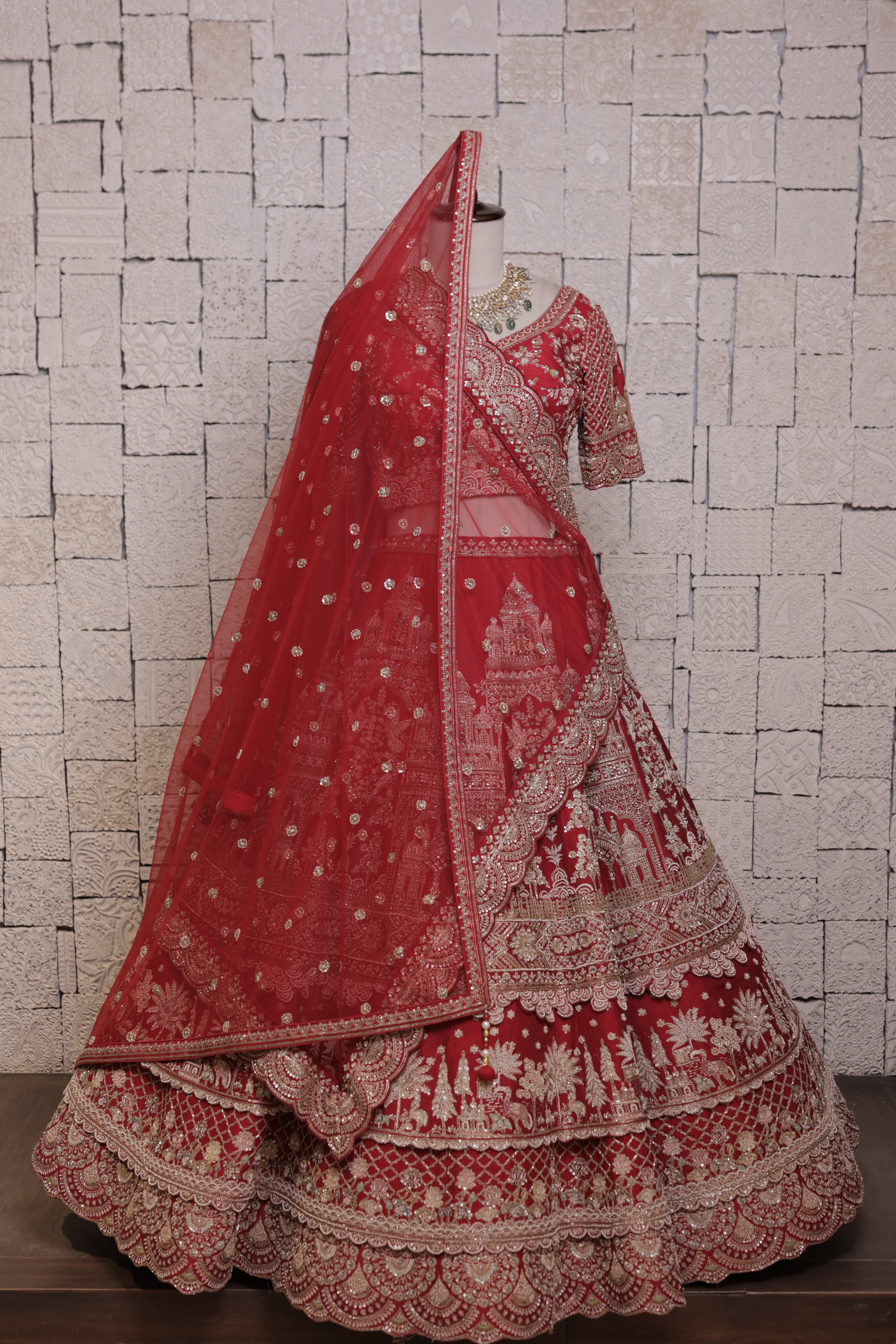 Red Multilayered Bridal Lehenga with Temple Embroidery