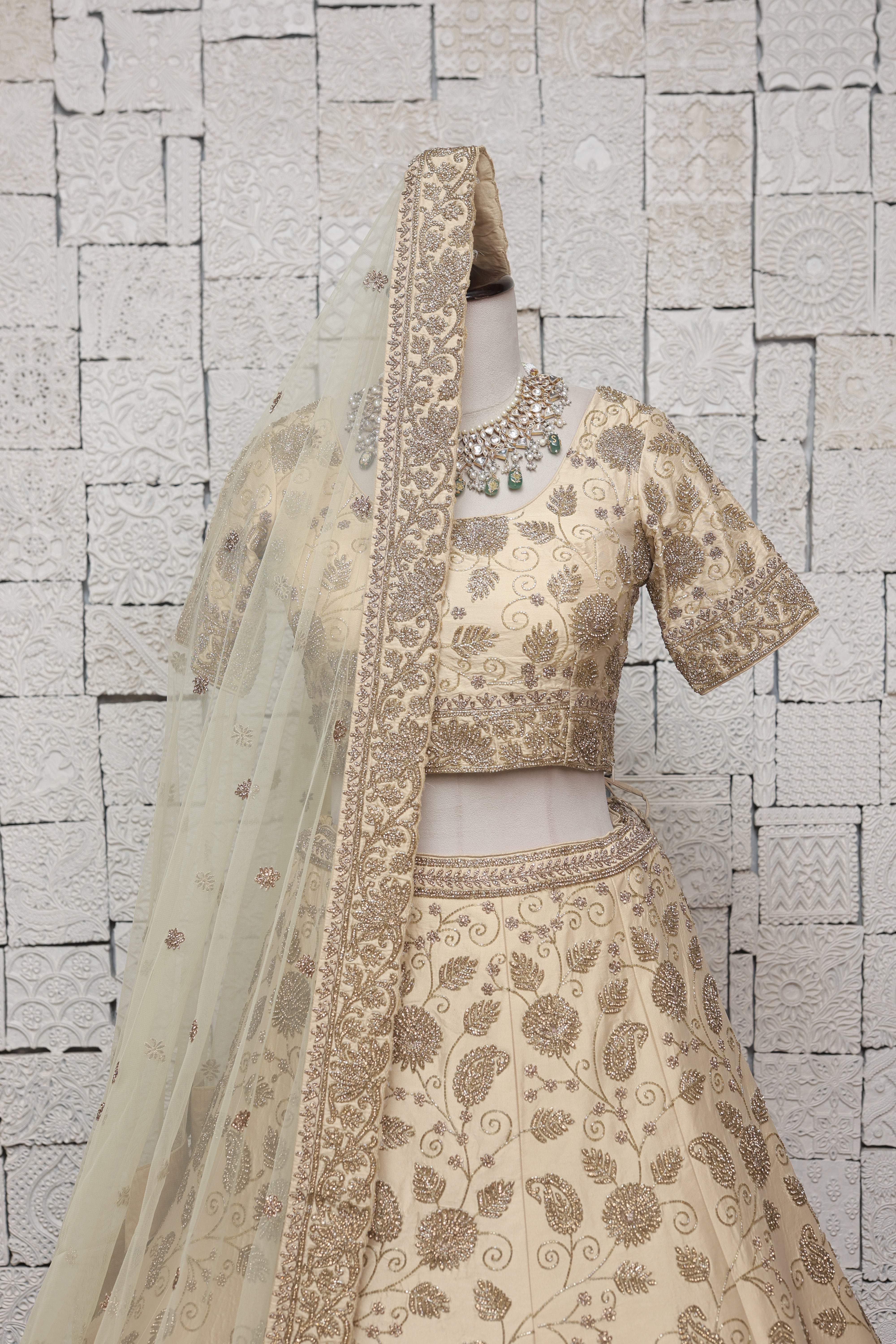 BEIGE SILK LEHENGA WITH ELABORATE HANDWORK