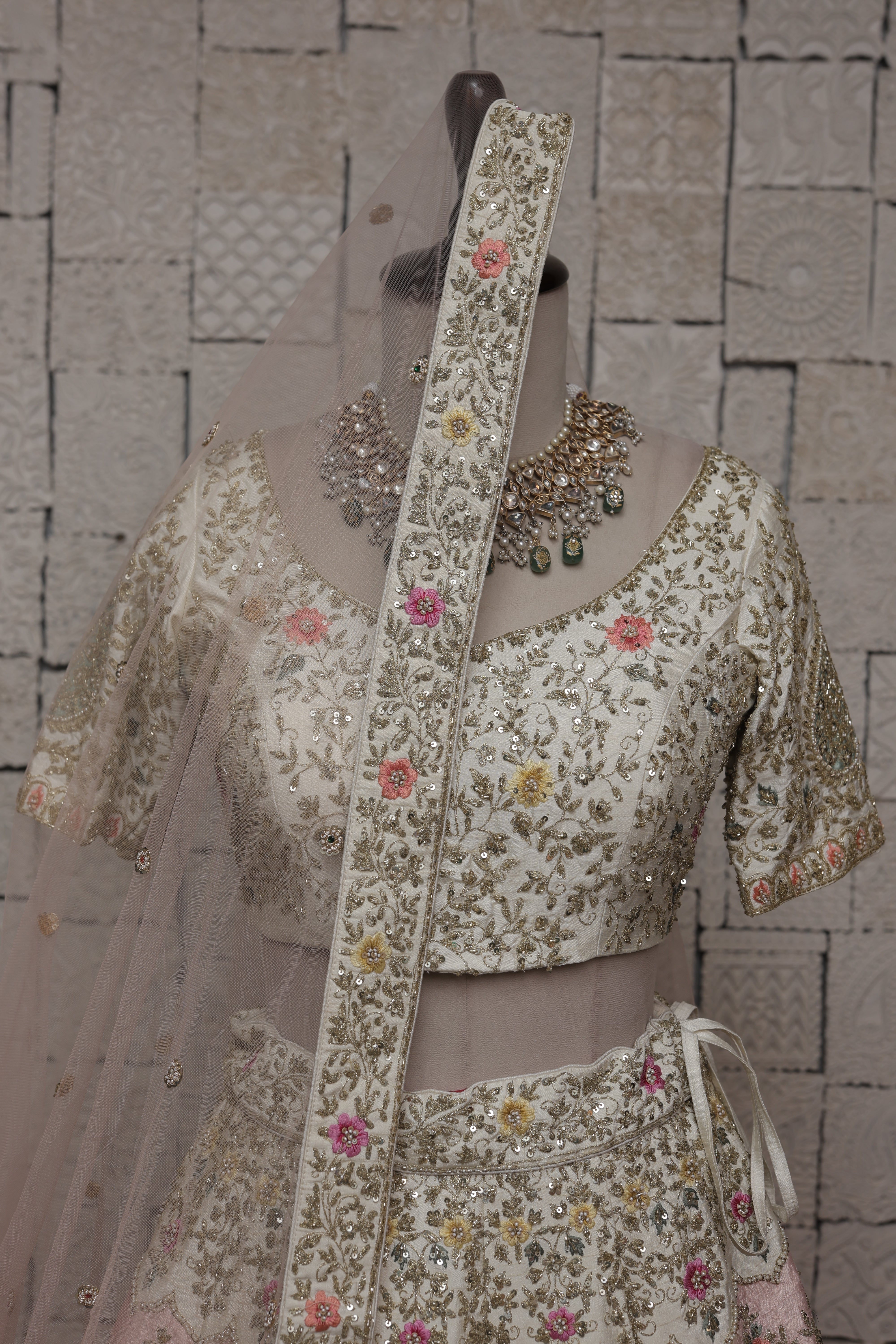 IVORY SILK LEHENGA WITH MULTICOLORED FLORAL EMBROIDERY