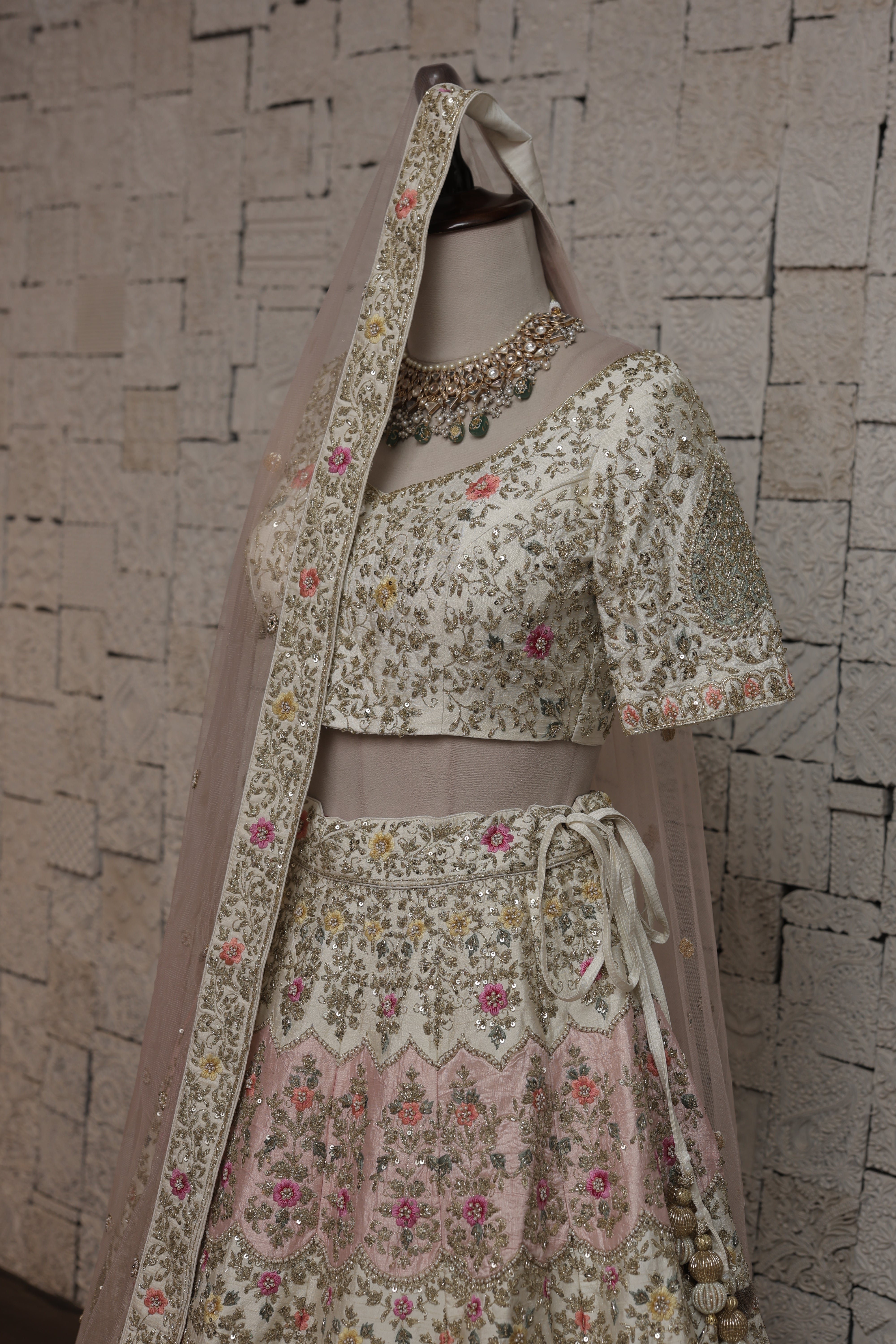 IVORY SILK LEHENGA WITH MULTICOLORED FLORAL EMBROIDERY