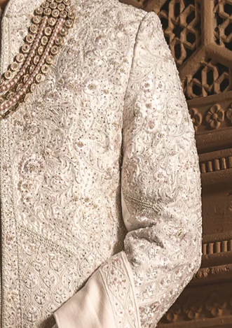 Ivory silk sherwani with silver embroidery with (accessories included)