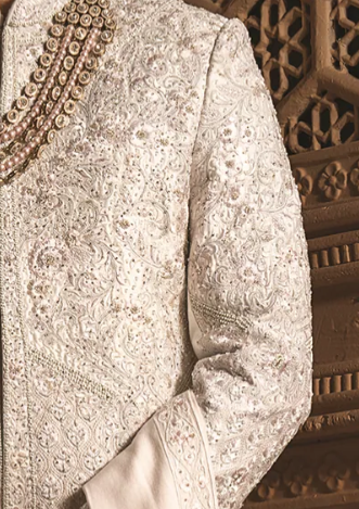 Ivory silk sherwani with silver embroidery with (Sherwani set)