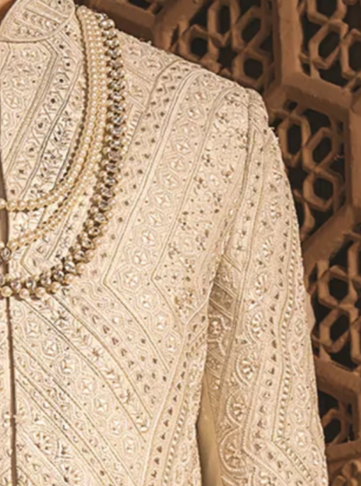 Cream Silk Sherwani With embellishments with (accessories included)