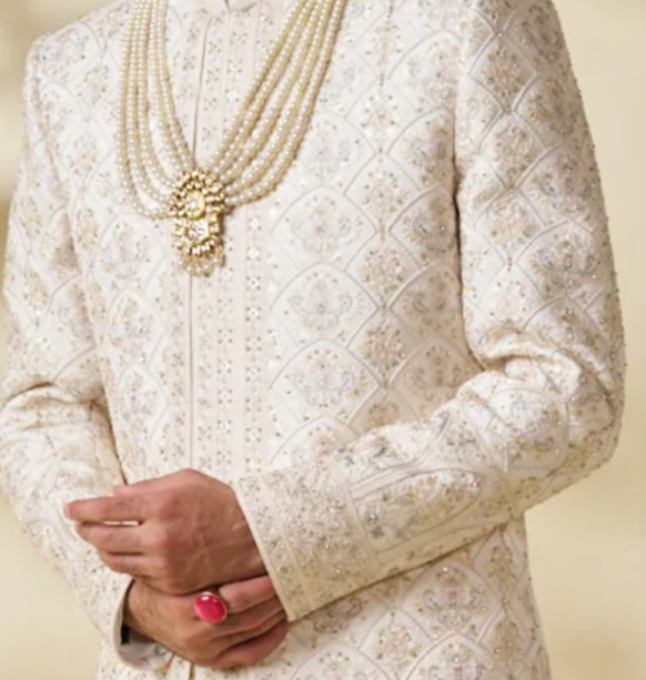 Cream silk sherwani set with embellishments (accessories included)