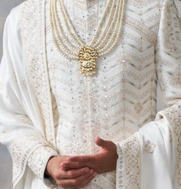 Ivory silk sherwani set with embellishments (accessories included)