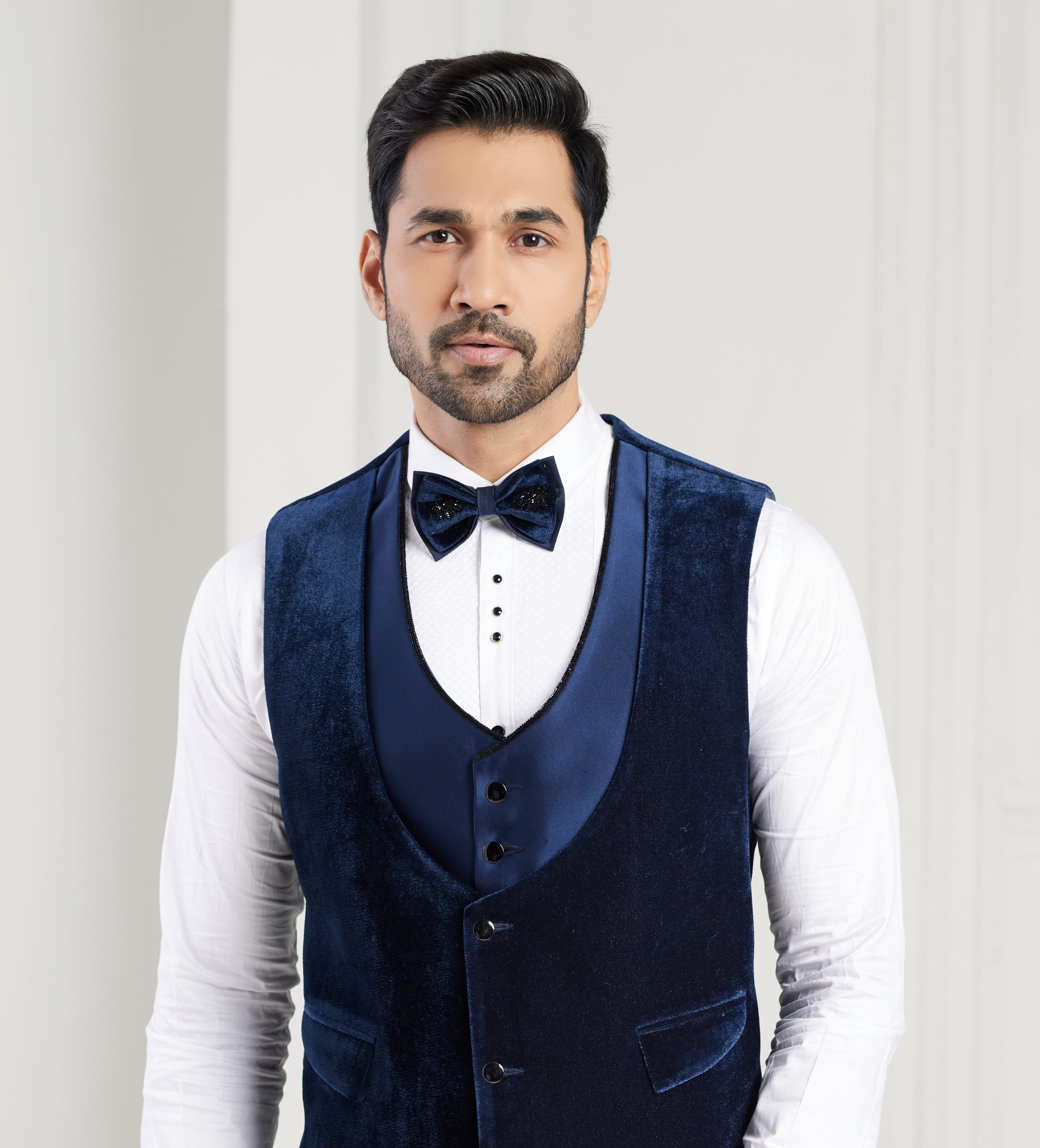 Blue men’s tuxedo with embroidery