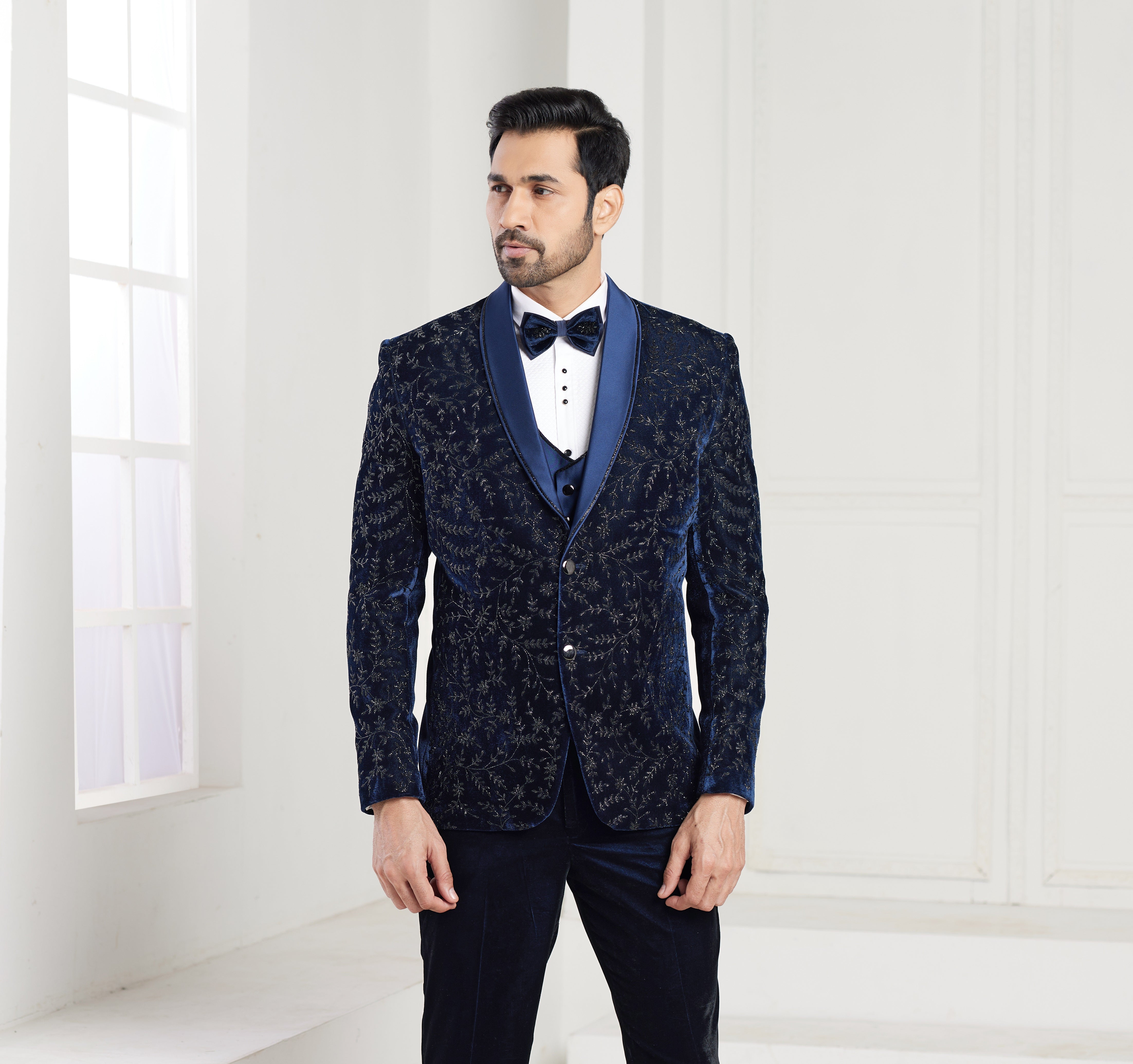 Blue men’s tuxedo with embroidery