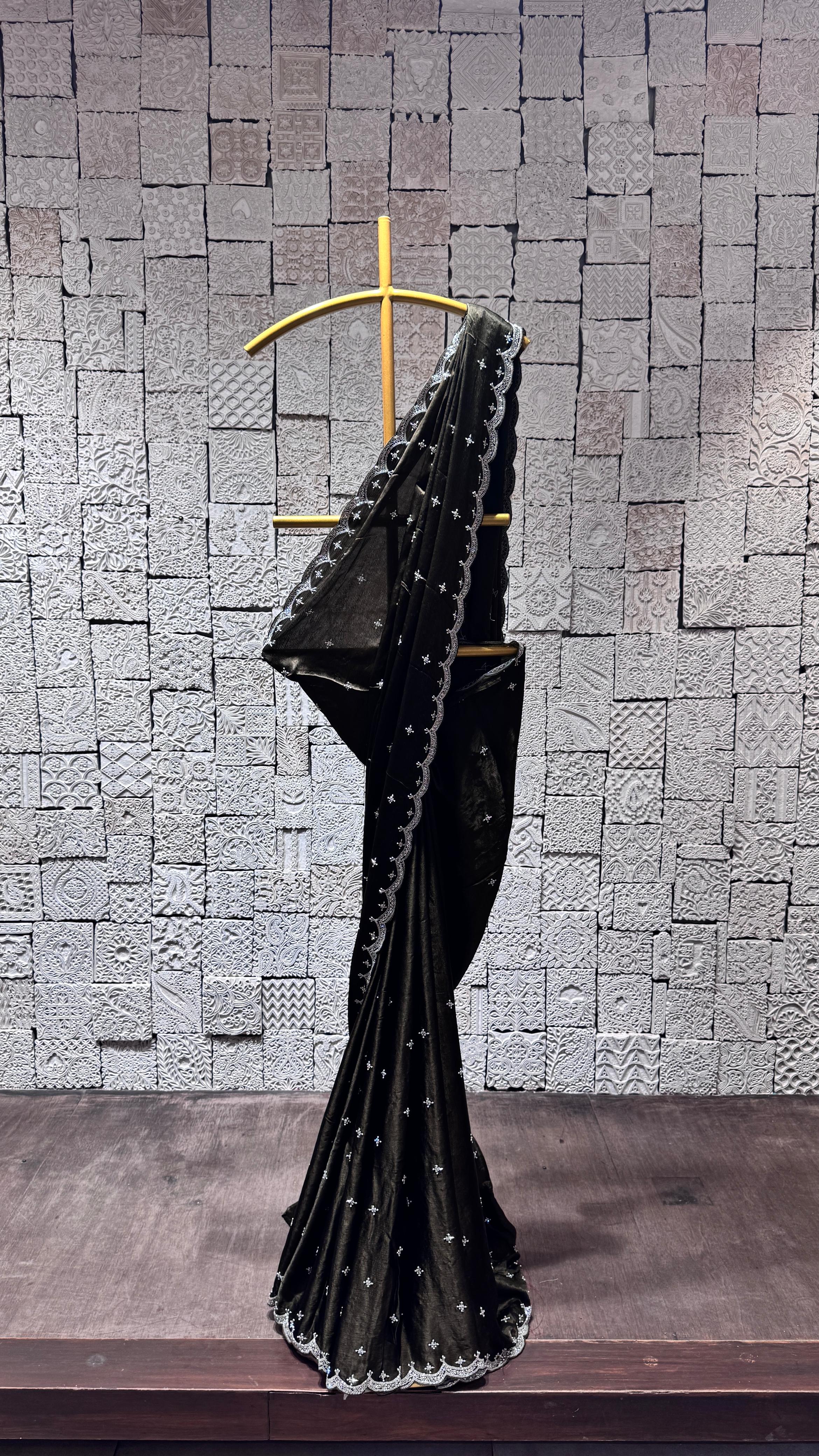 Green saree with heavy border