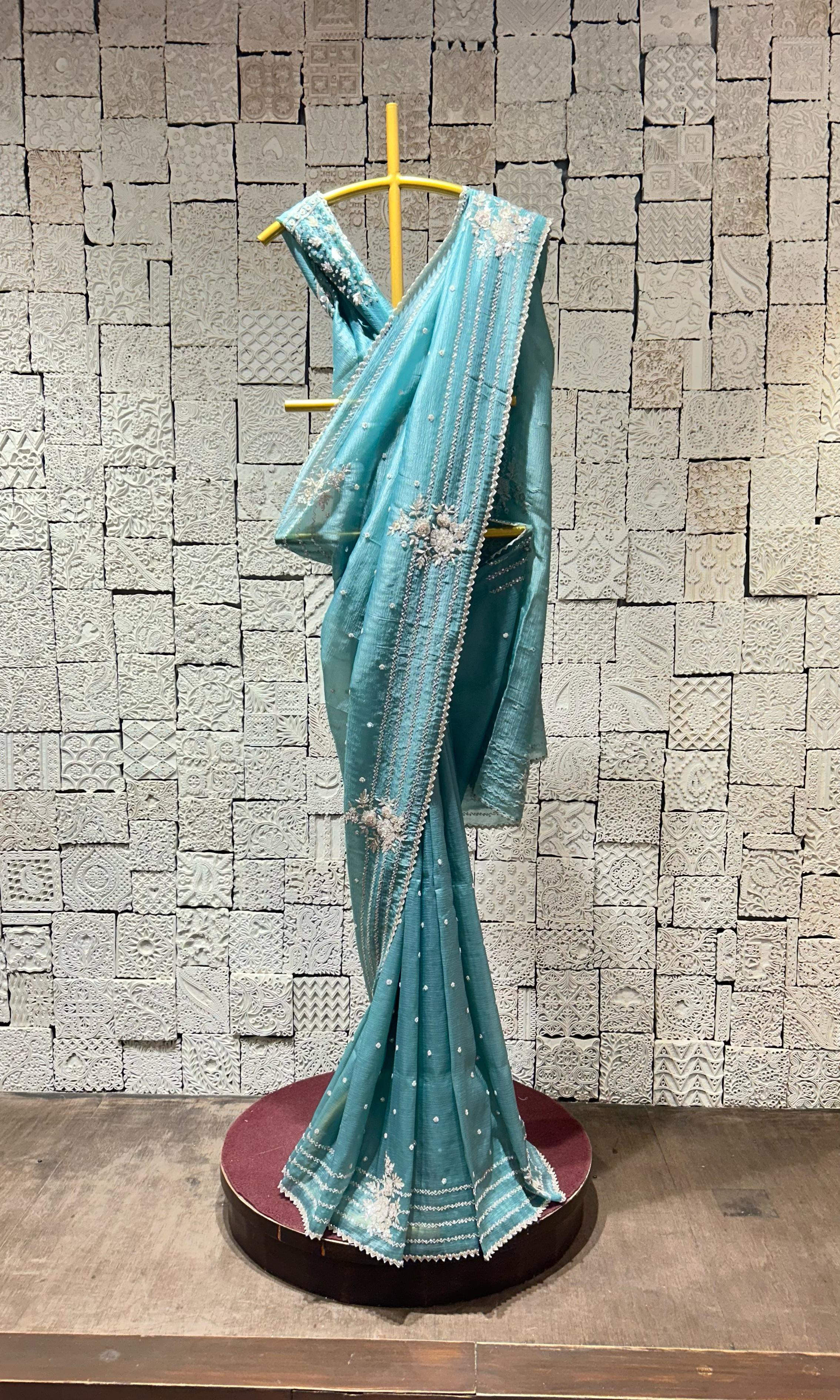 Light blue saree with zig-zag border