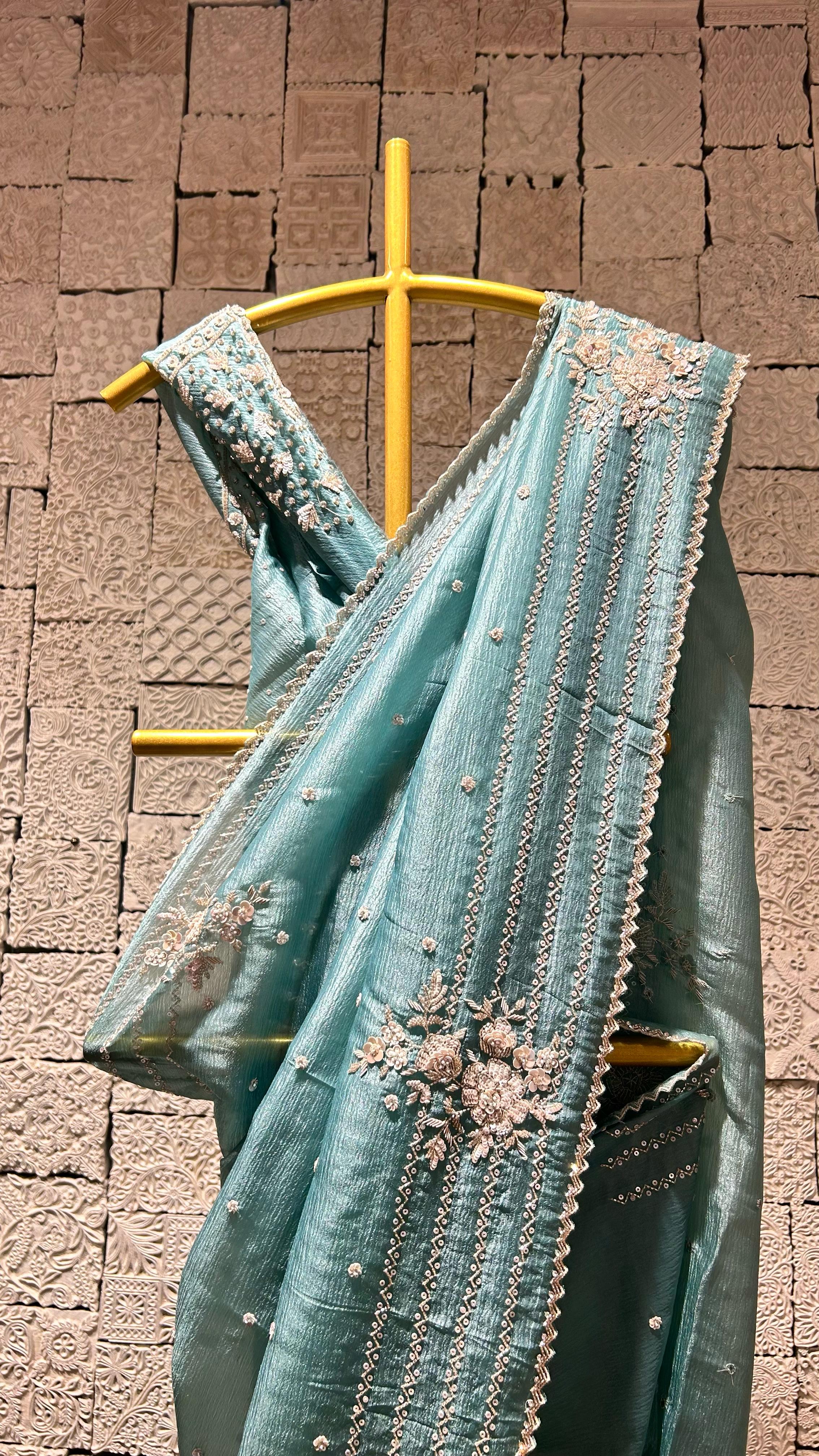 Light blue saree with zig-zag border