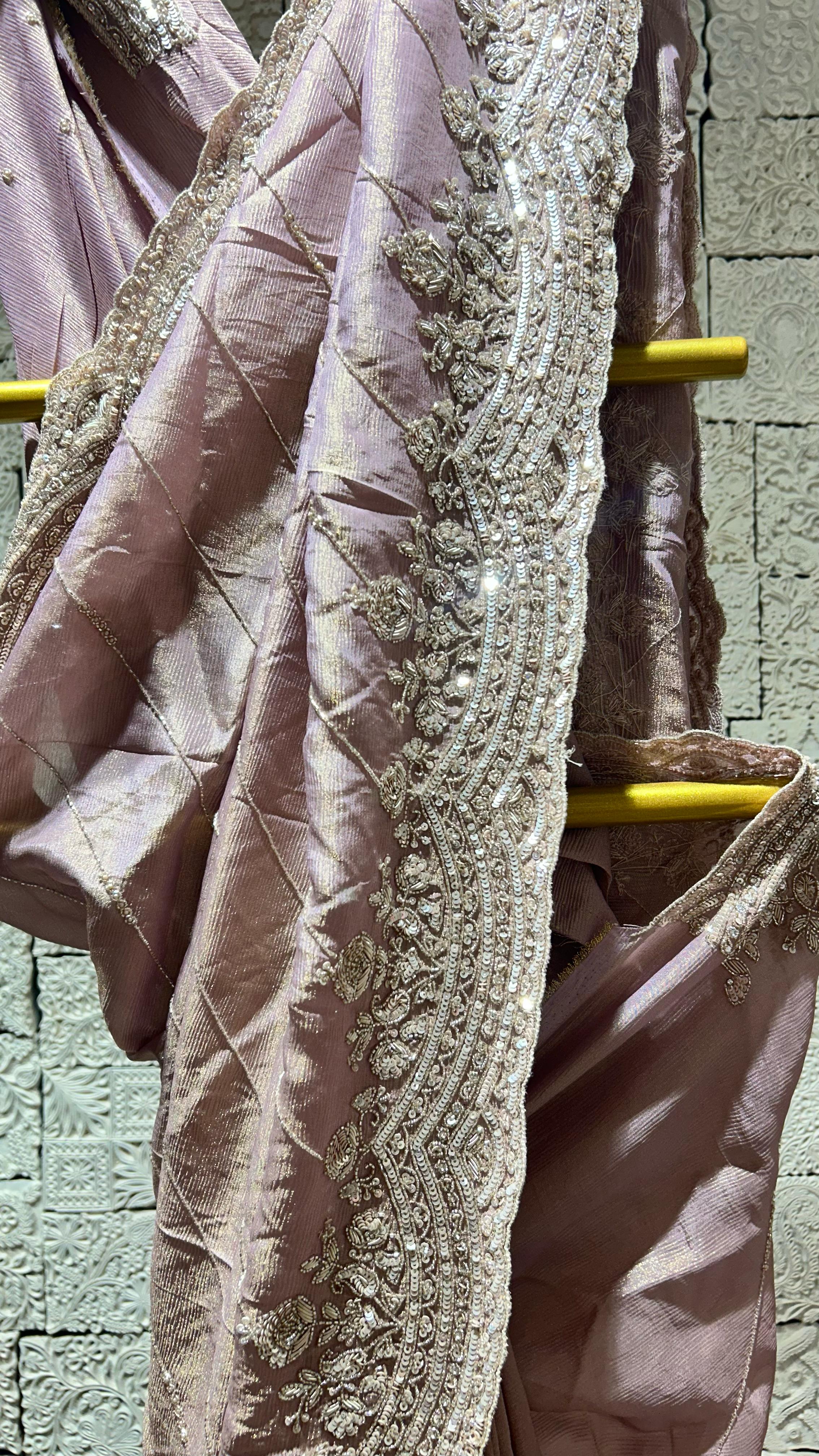 Onion color saree with heavy floral border